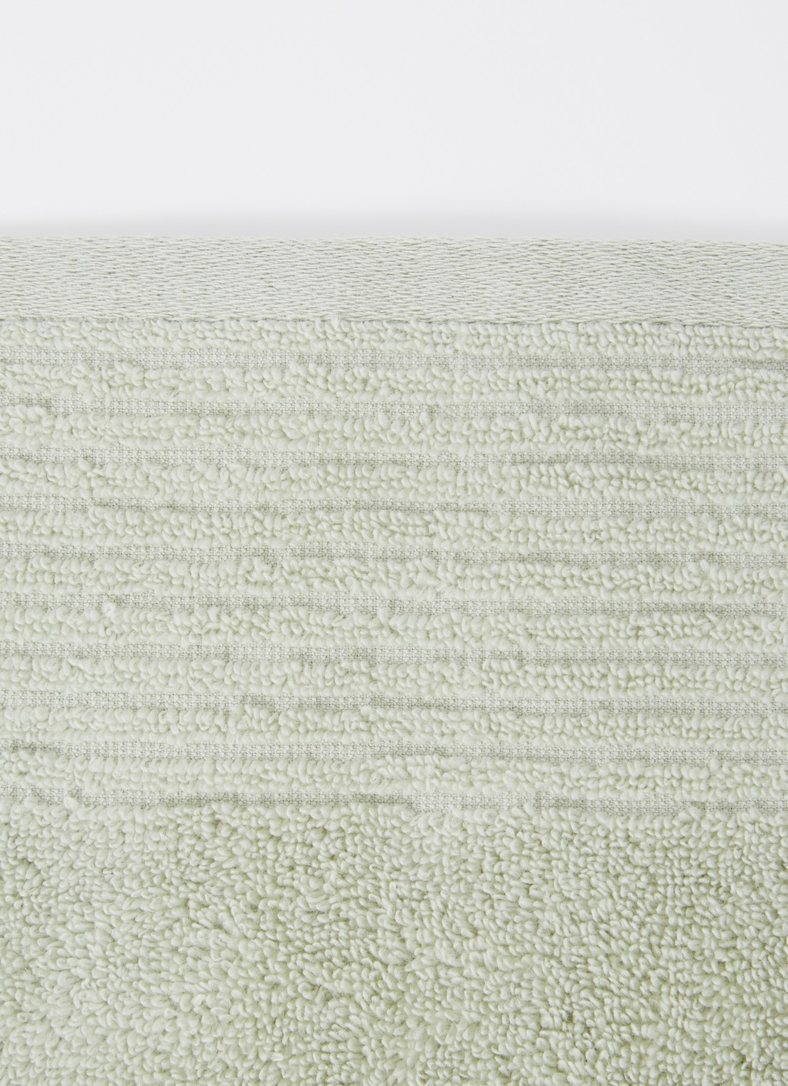 Olivier Desforges Alizee badlaken van katoen 450 gr/m2 - 70 x 140 cm - detail lindegroen