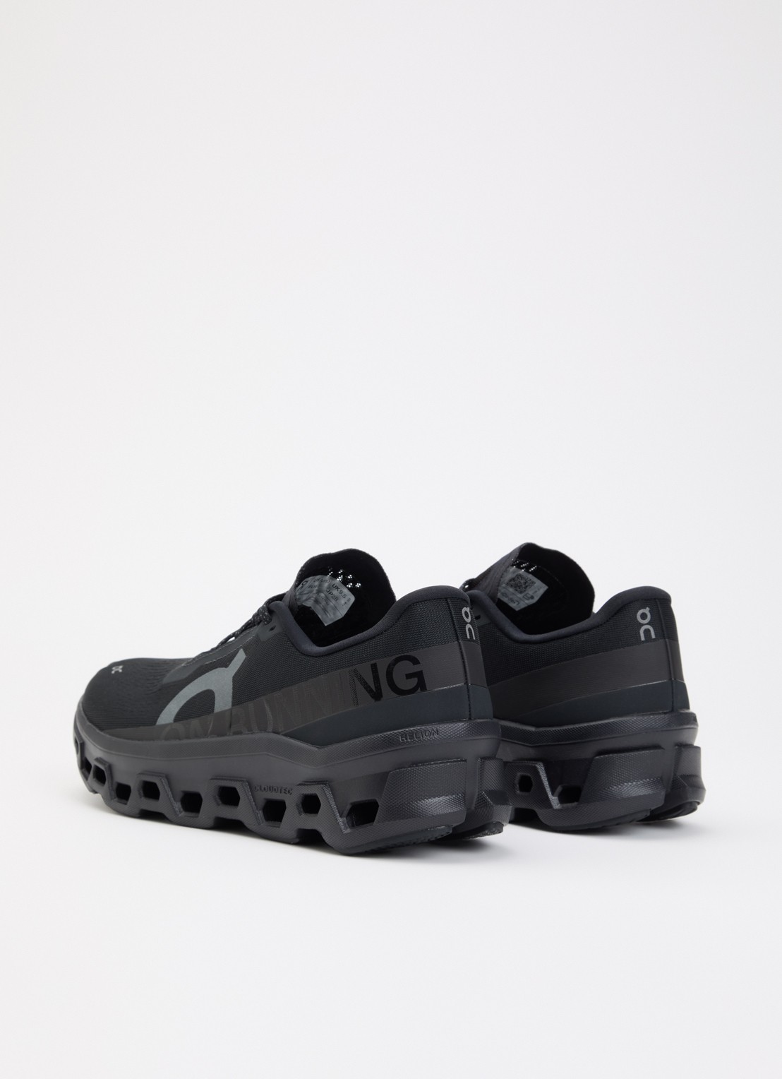 On Cloudmonster sneaker van mesh met logo - achterkant zwart