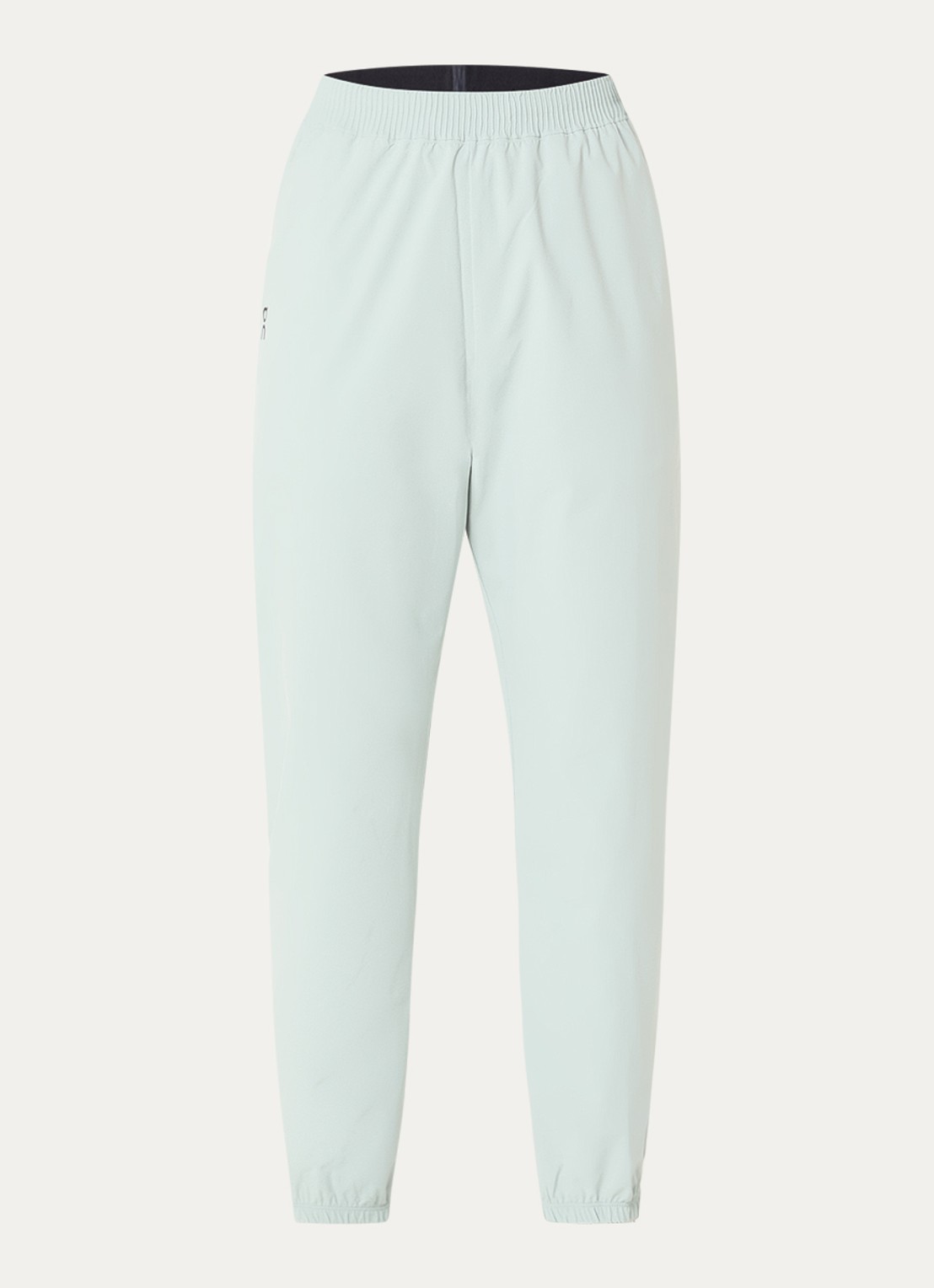 On Focus high waist tapered fit trackpants met steekzakken - voorkant lindegroen