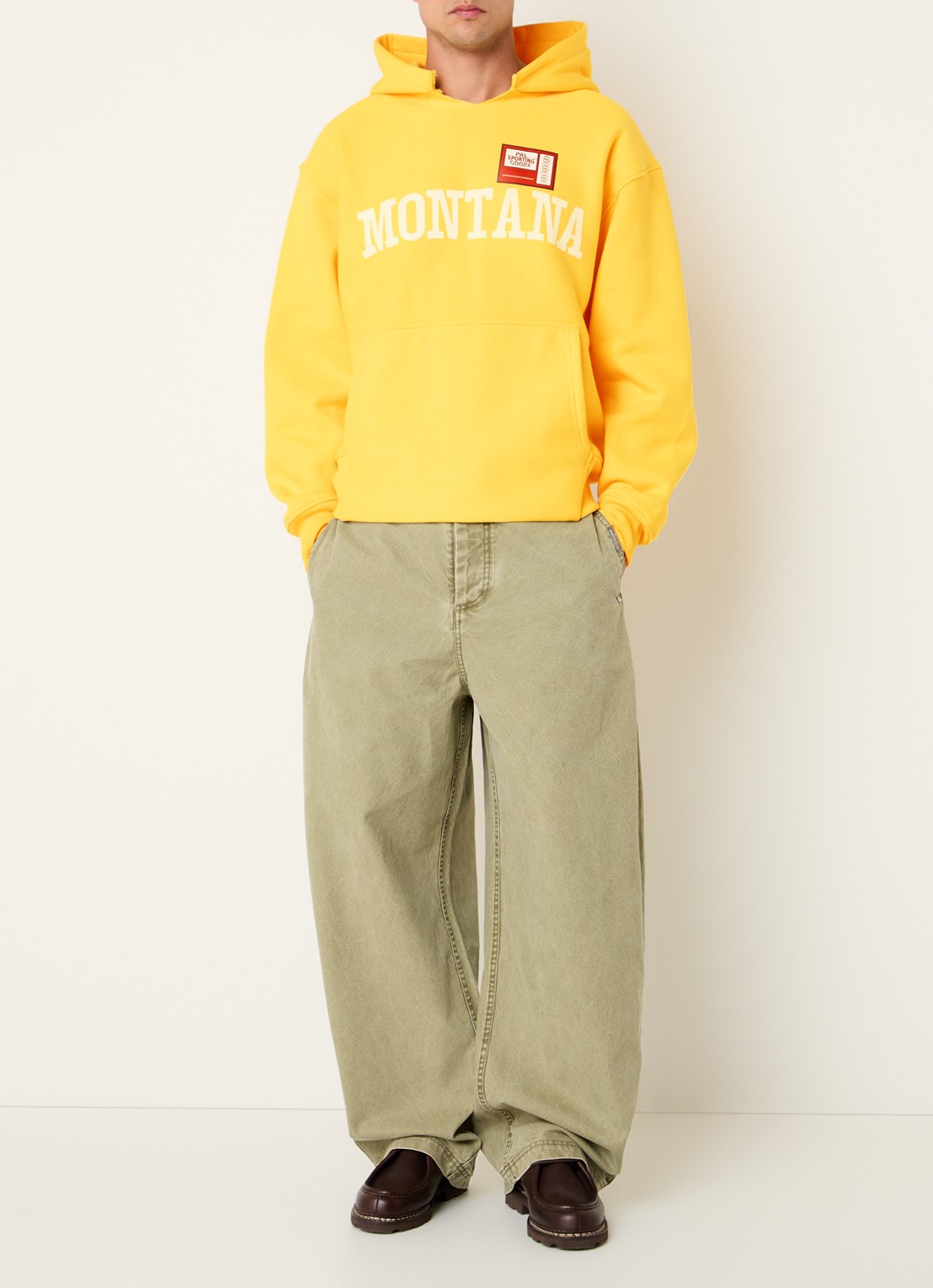 PAL Sporting Goods Montana hoodie met logoprint en destroyed afwerking - voorkant 3 geel