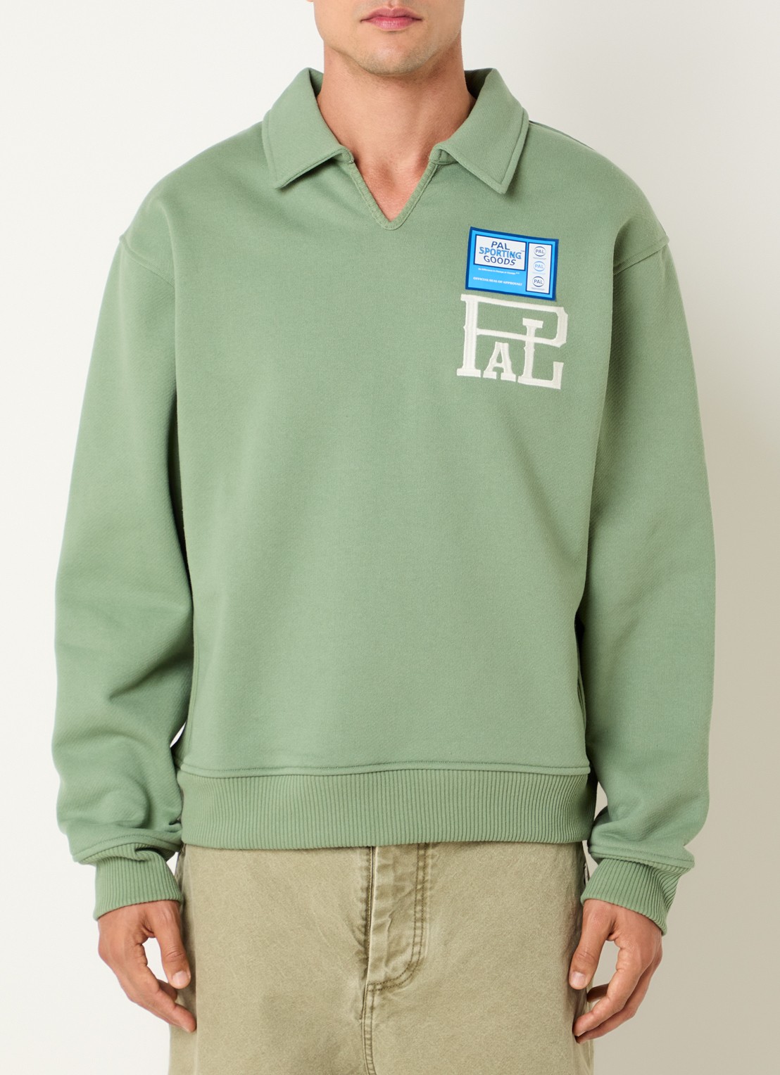 PAL Sporting Goods P&L sweater met logoborduring en polokraag - achterkant 4 lindegroen