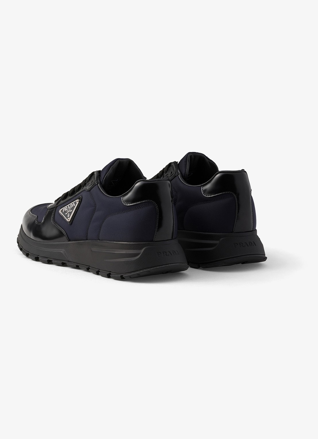 Prada Prax Re-Nylon sneaker met leren details - achterkant blauw