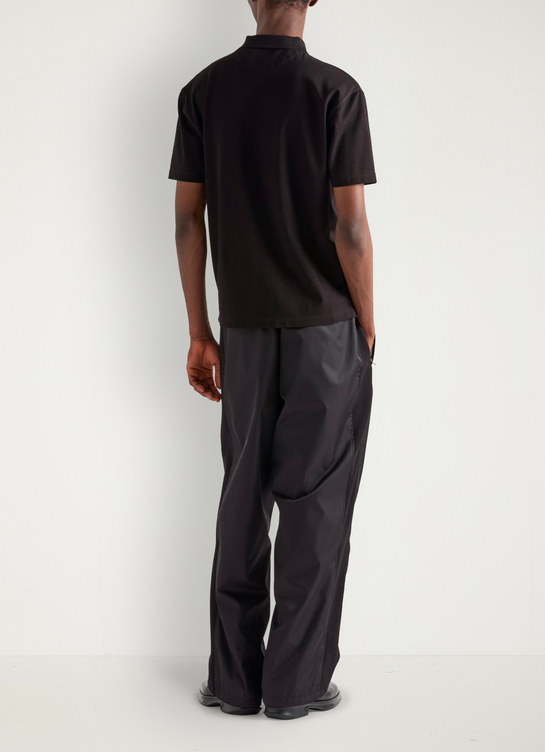 Prada Re-Nylon oversized fit polo van piqué katoen met halve rits - achterkant 5 zwart