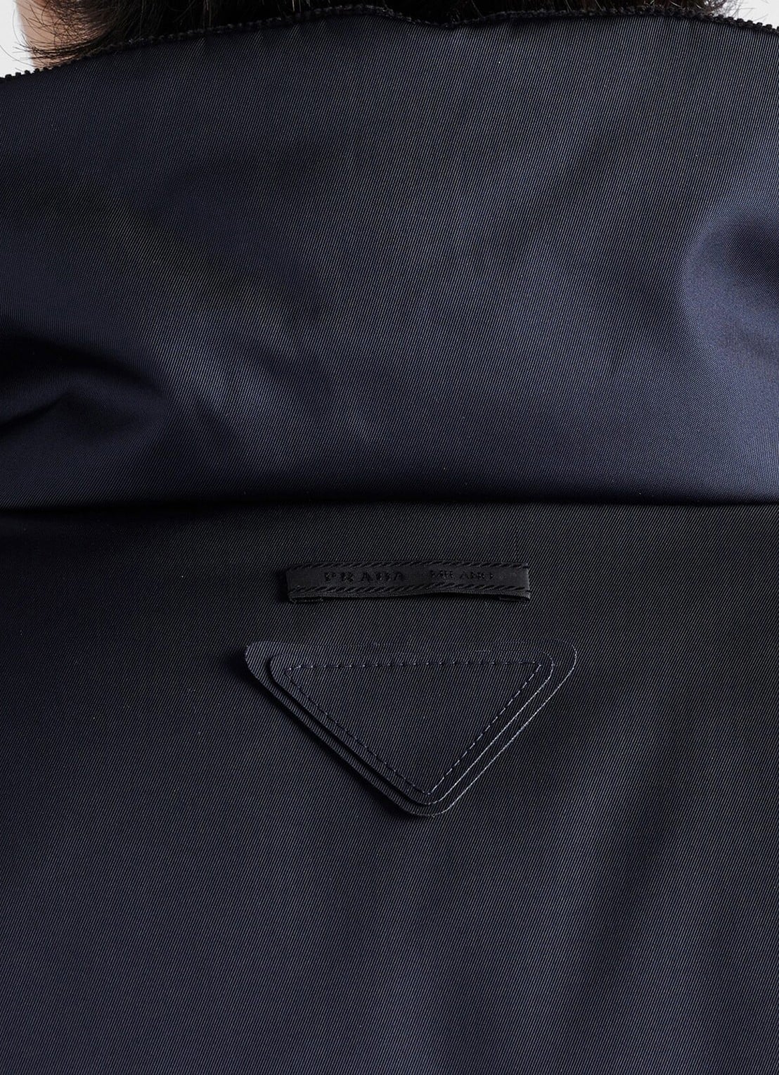 Prada Re-Nylon puffer jack met donsvulling - detail 2 blauw