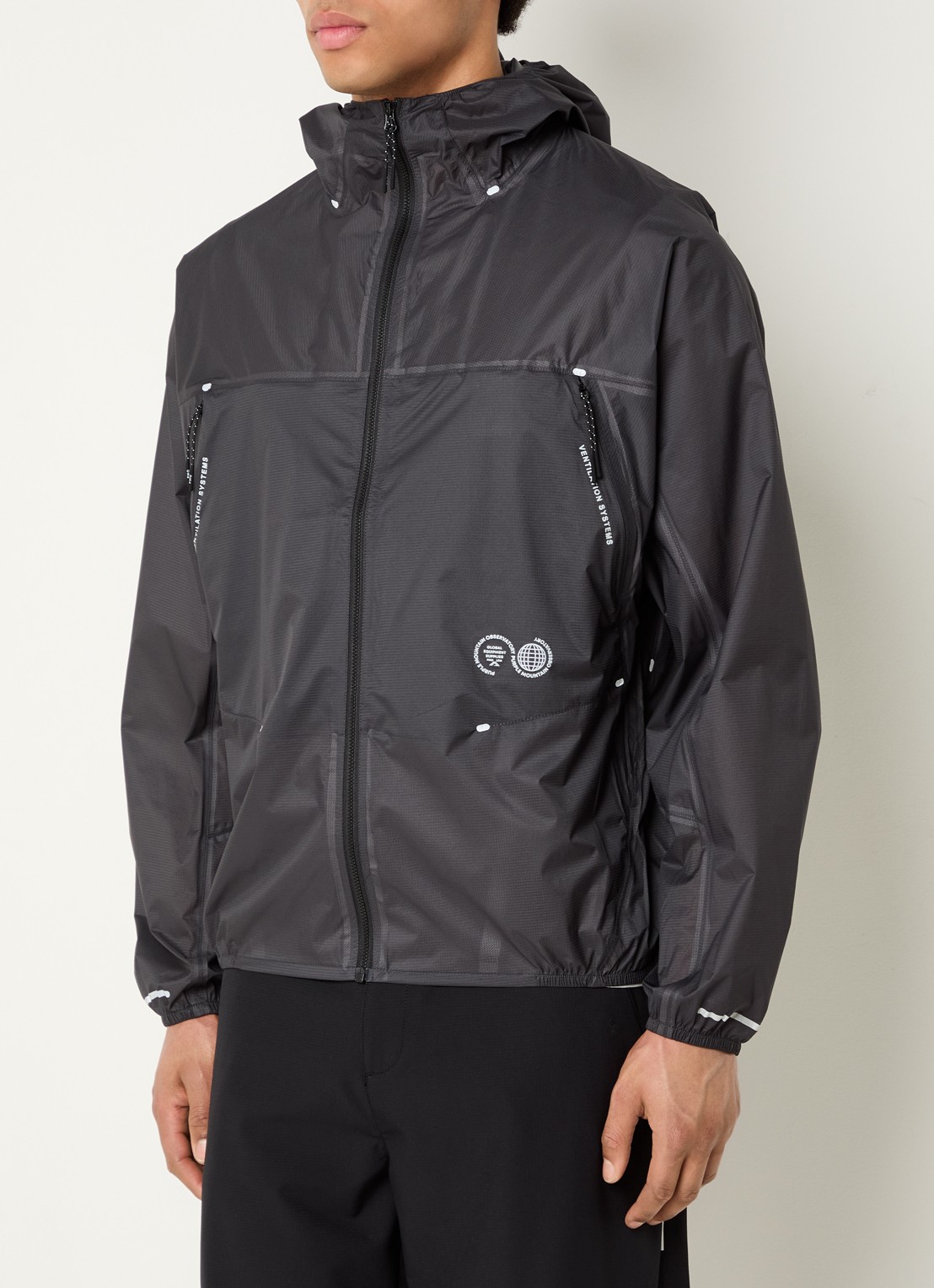 Purple Mountain Stinger jack met capuchon en ritszakken - detail antraciet