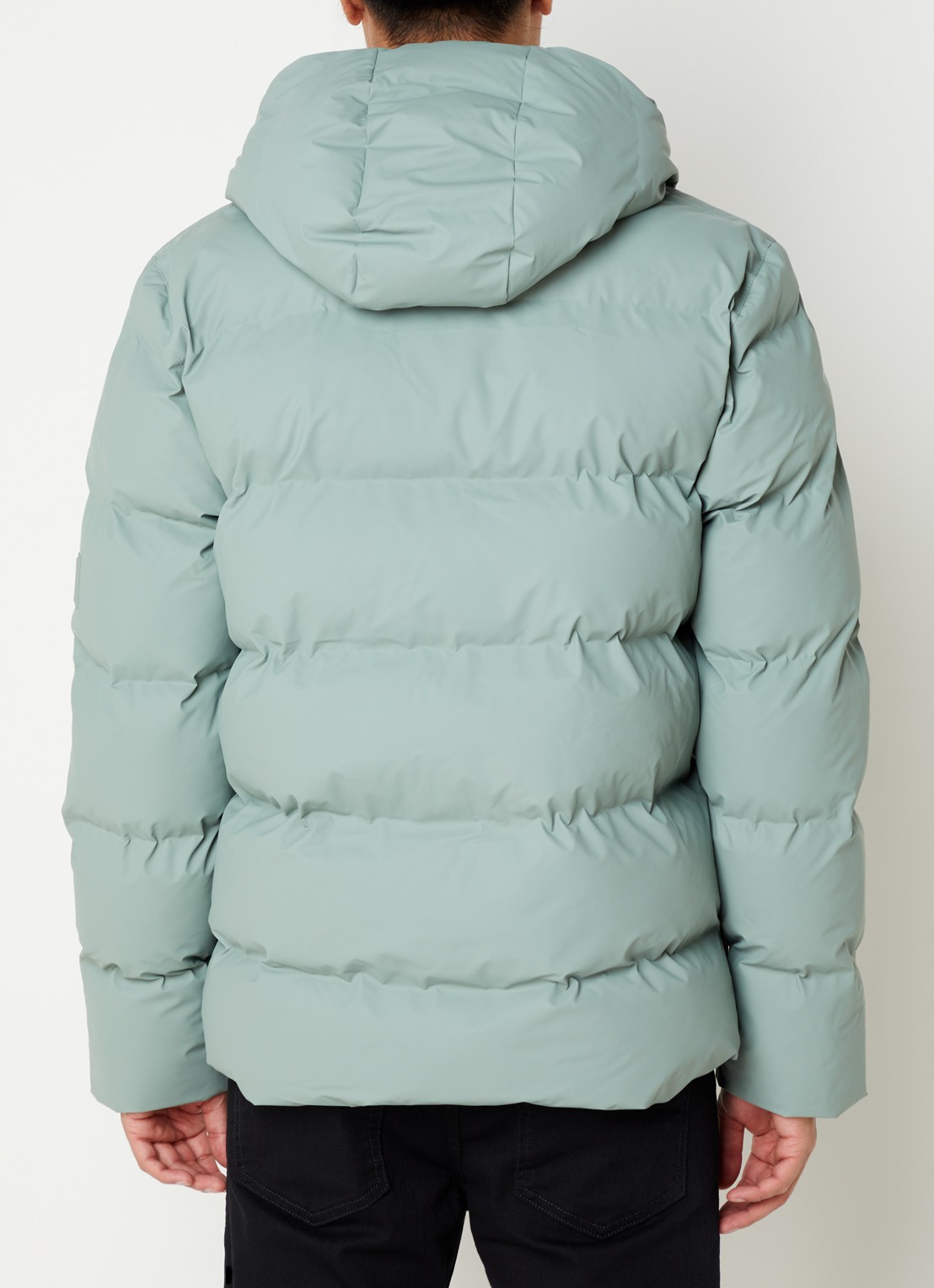 Rains Alta puffer jack met capuchon en steekzakken - achterkant 2 lindegroen