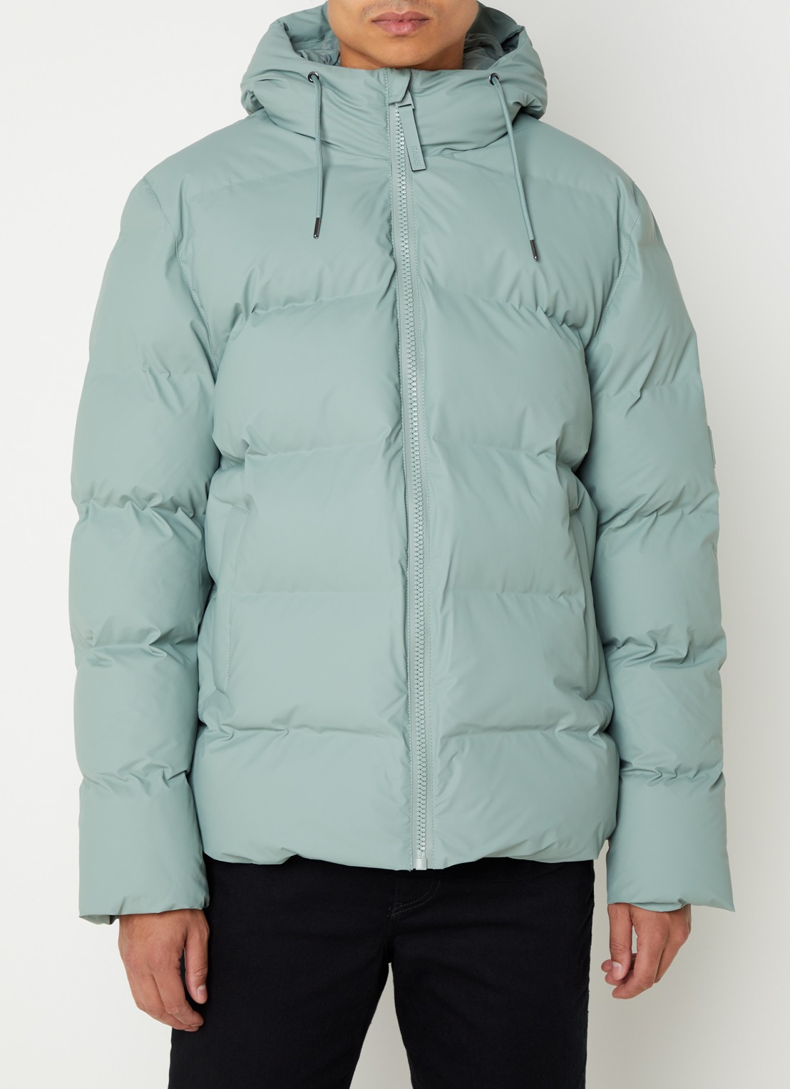 Rains Alta puffer jack met capuchon en steekzakken - detail lindegroen