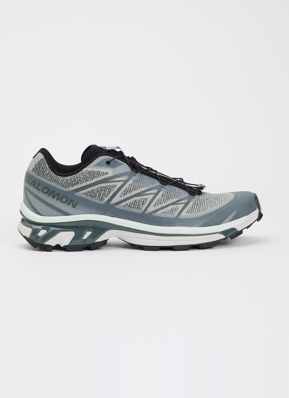 Salomon XT-6 Shadow sneaker met gebreid bovenwerk en logo - voorkant grijs