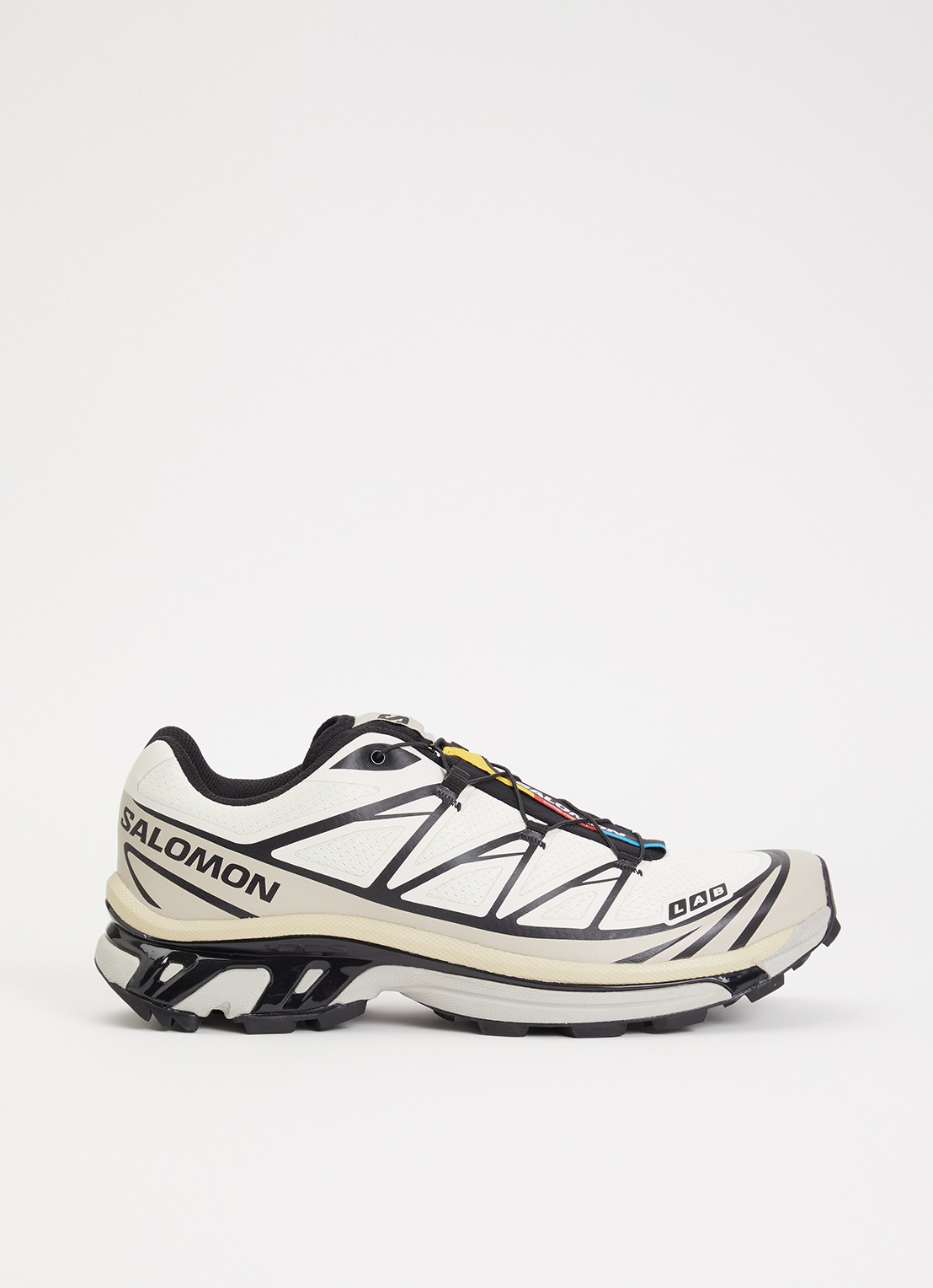 Salomon XT-6 sneaker met details van mesh - voorkant vanillegeel
