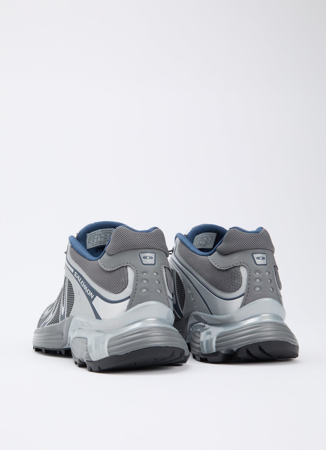 Salomon XT-Whisper sneaker met mesh details - achterkant grijs