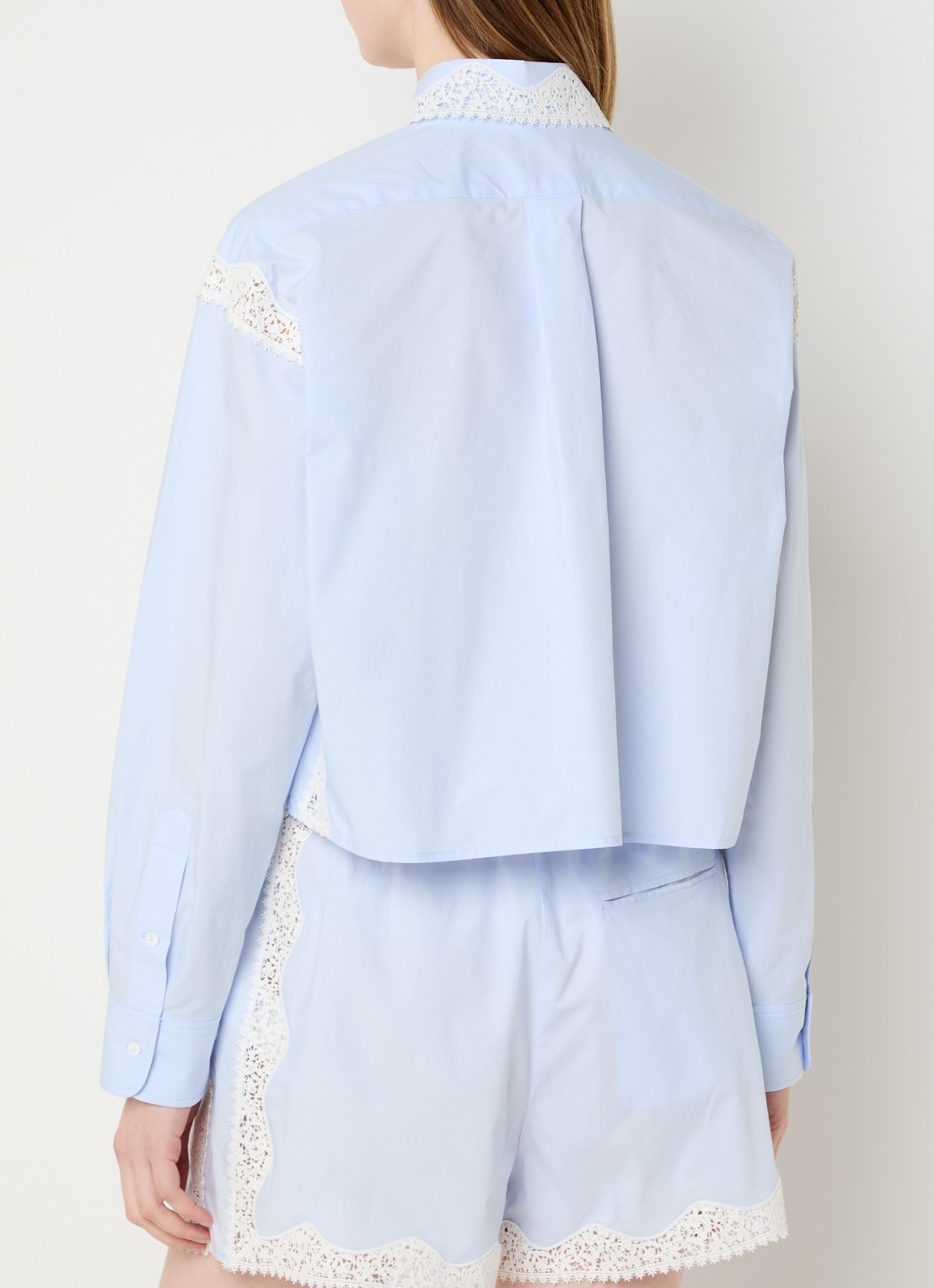 Sandro Blouse met details van kant - achterkant lichtblauw