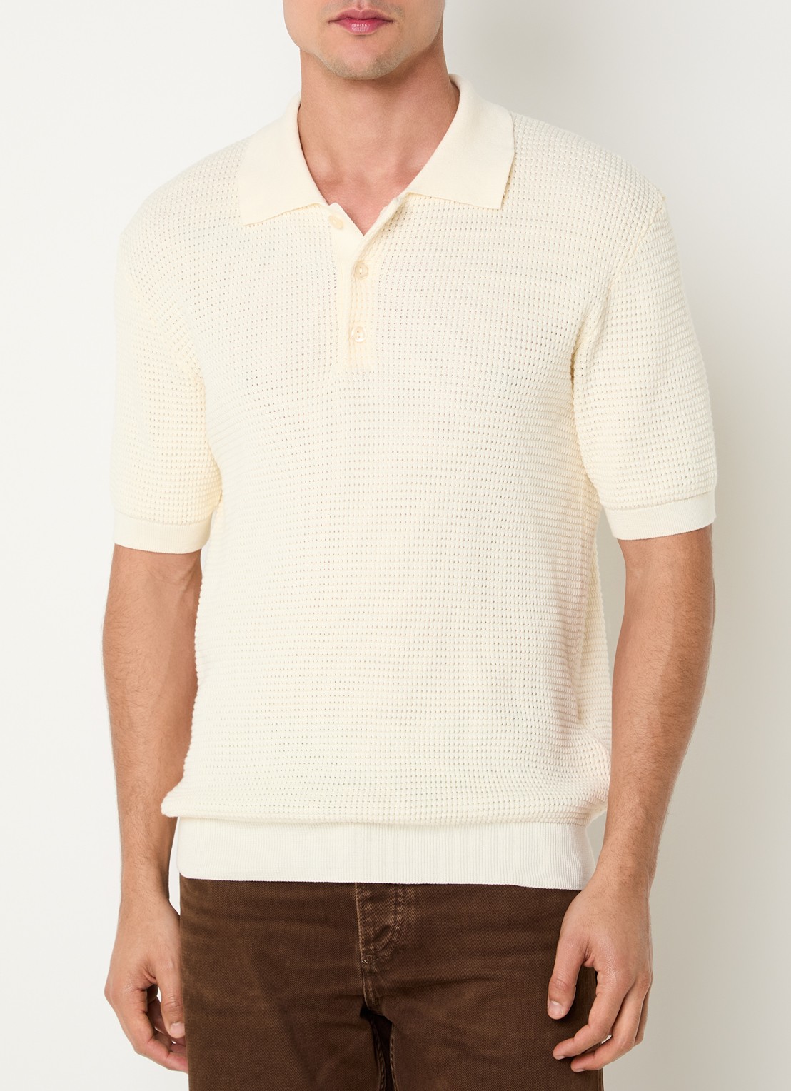 Sandro Fijngebreide polo met stretch - detail creme