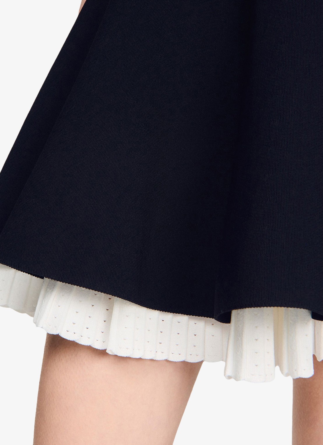 Sandro Gebreide mini rok met plooien - detail 6 zwart