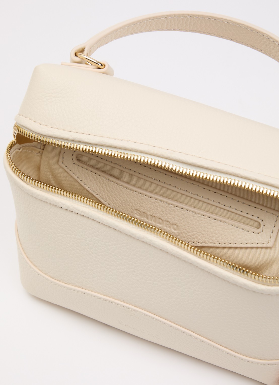 Sandro Handtas van leer met afneembare schouderriem - detail beige