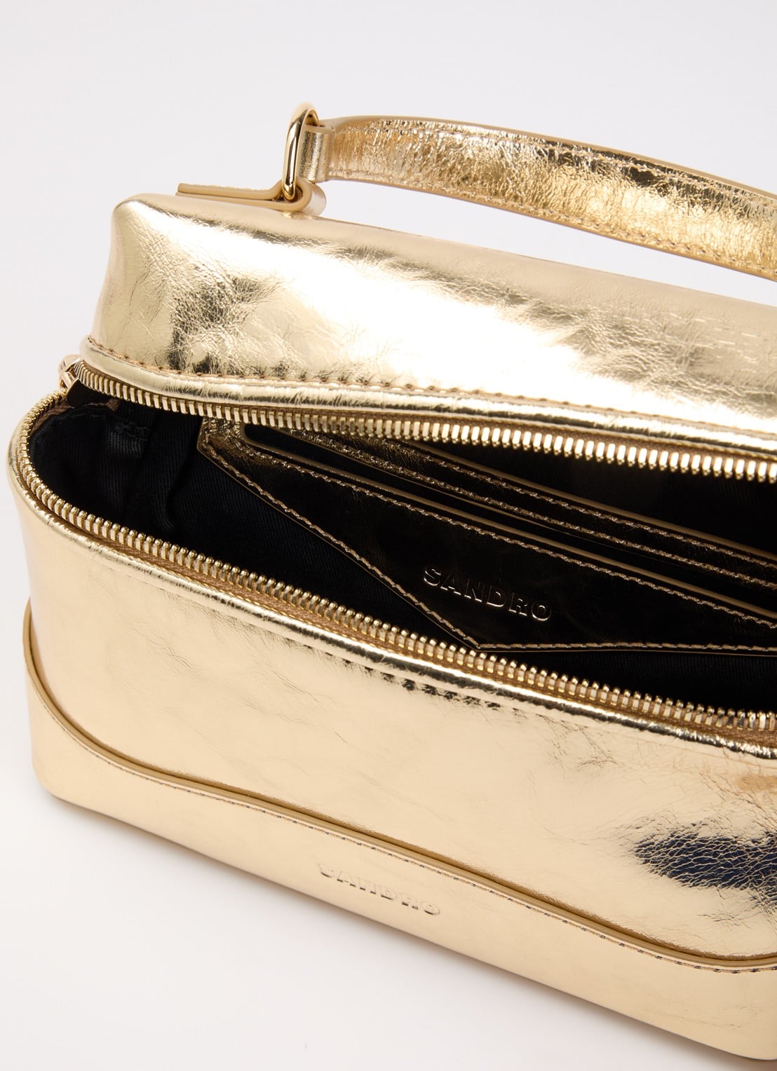 Sandro Handtas van leer met afneembare schouderriem - detail goud