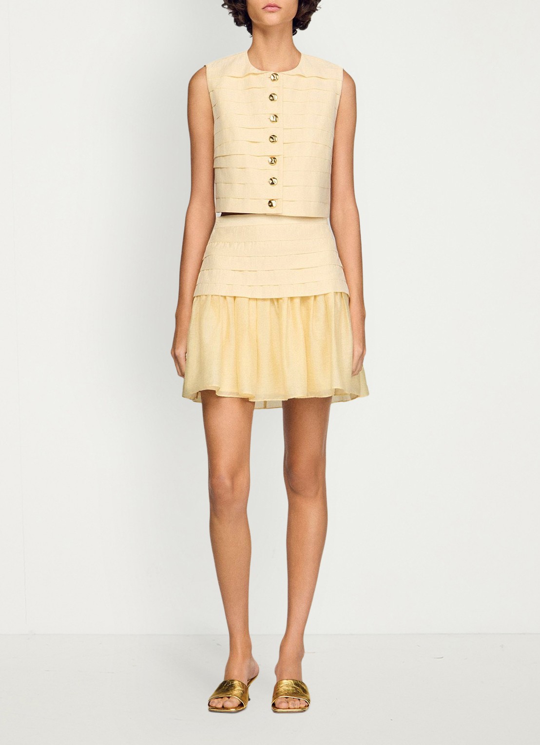 Sandro Mini rok met plooien - detail 2 vanilla / geel