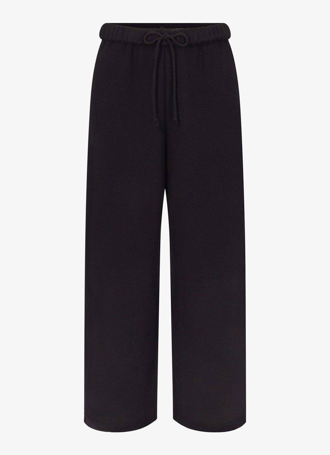SKIMS Cotton Fleece mid waist straight fit loungebroek met steekzakken - voorkant zwart