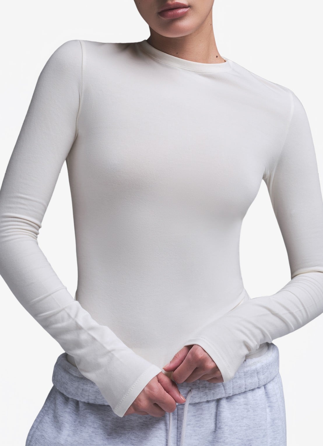 SKIMS Cotton Jersey longsleeve met opstaande hals  - detail gebroken wit