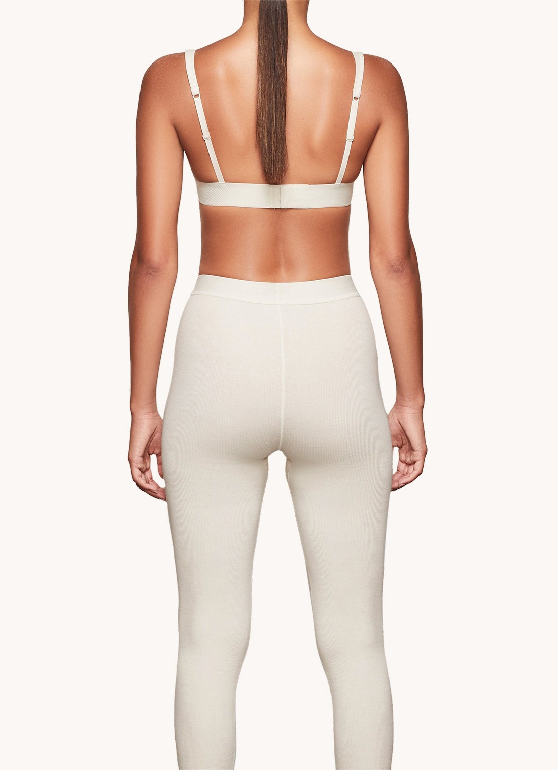SKIMS Cotton Rib high waist loungebroek met ribstructuur - achterkant gebroken wit