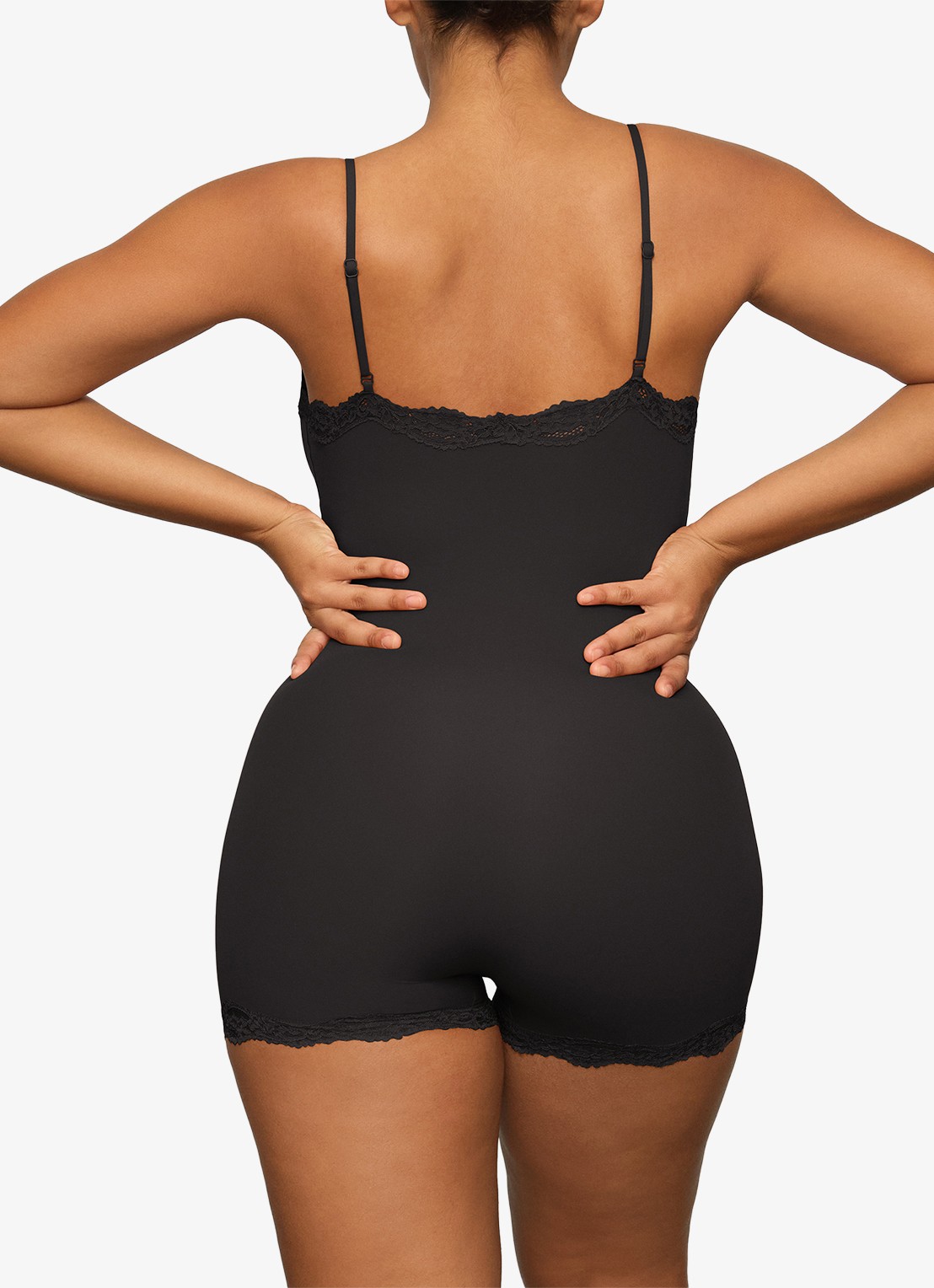SKIMS Fits Everybody playsuit met details van kant - achterkant zwart
