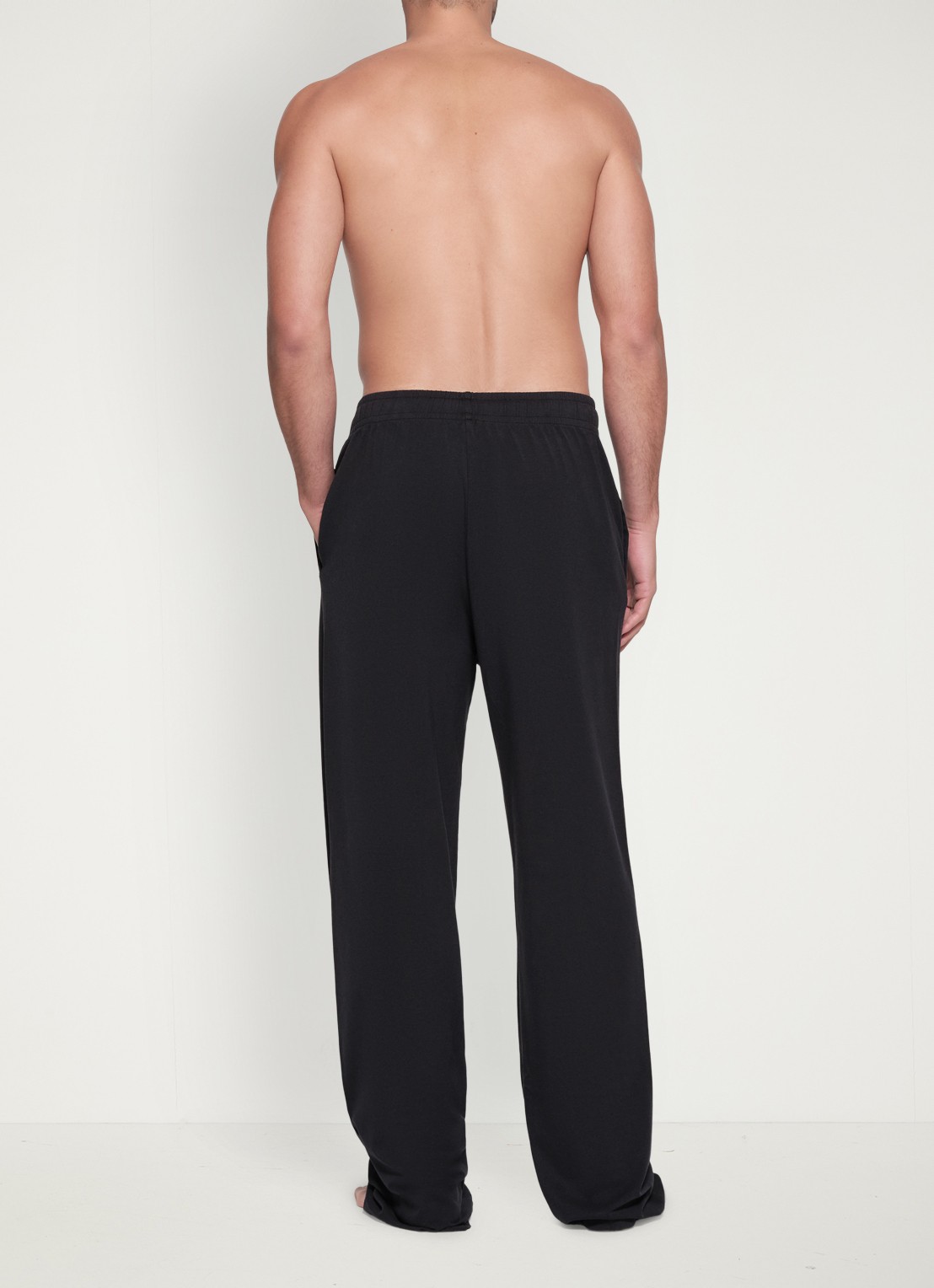 SKIMS Jersey Lounge straight fit loungebroek met steekzakken - achterkant zwart