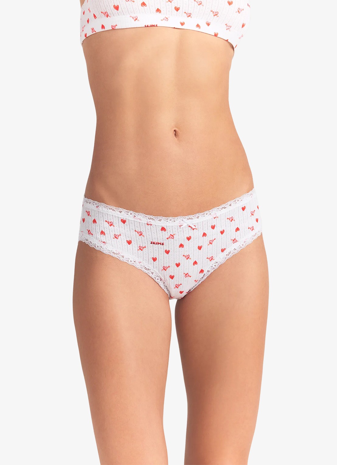 SKIMS Lightweight Cotton Pointelle slip met print en kant - detail 4 snow arrowed hearts