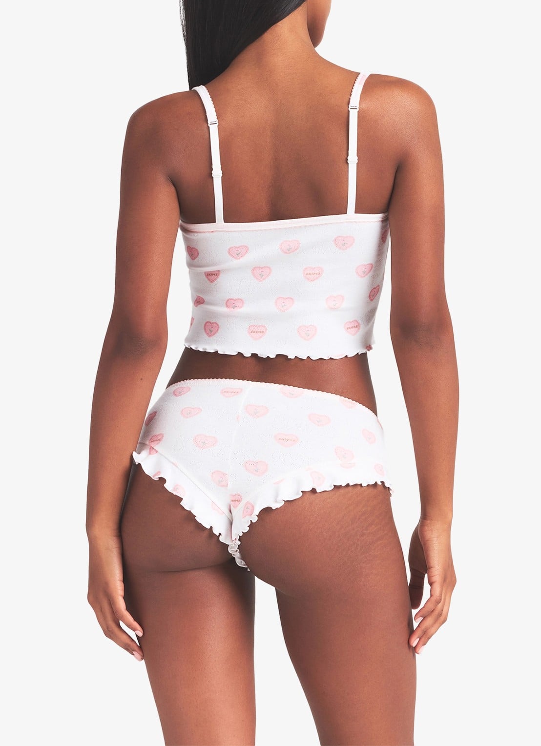 SKIMS Pointelle pyjamaset met print  - achterkant 4 snow lace hearts