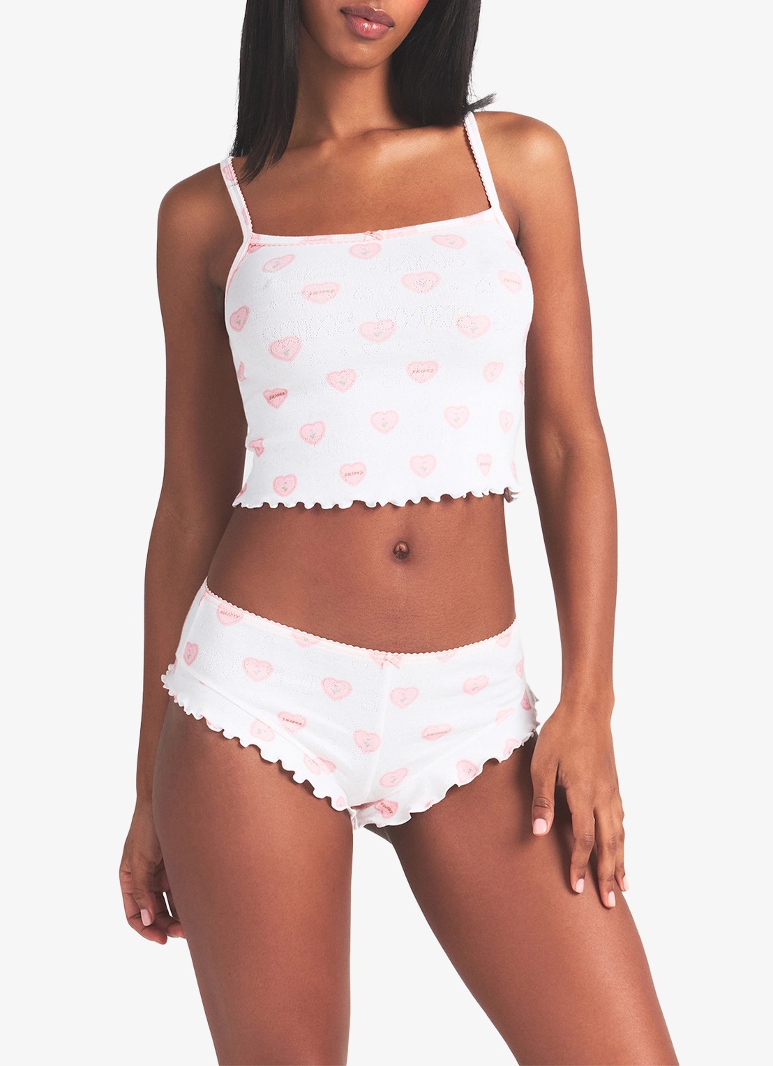 SKIMS Pointelle pyjamaset met print  - detail snow lace hearts