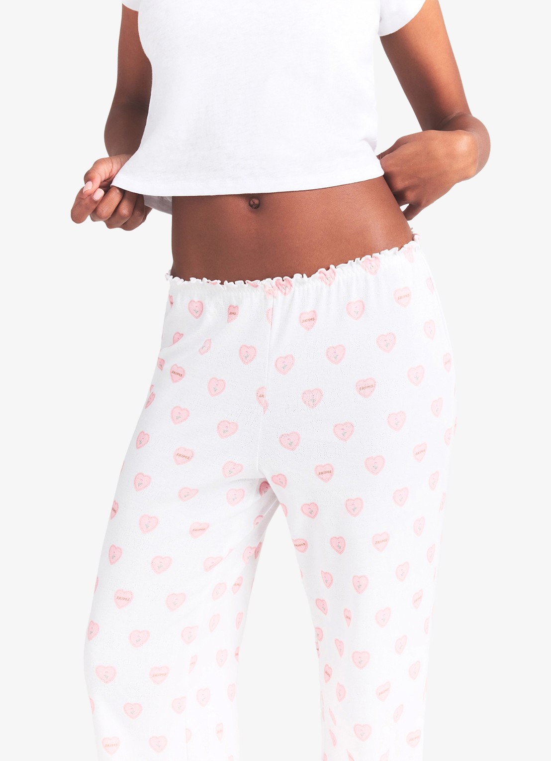 SKIMS Pointelle straight fit pyjamabroek met print - detail 3 snow lace hearts