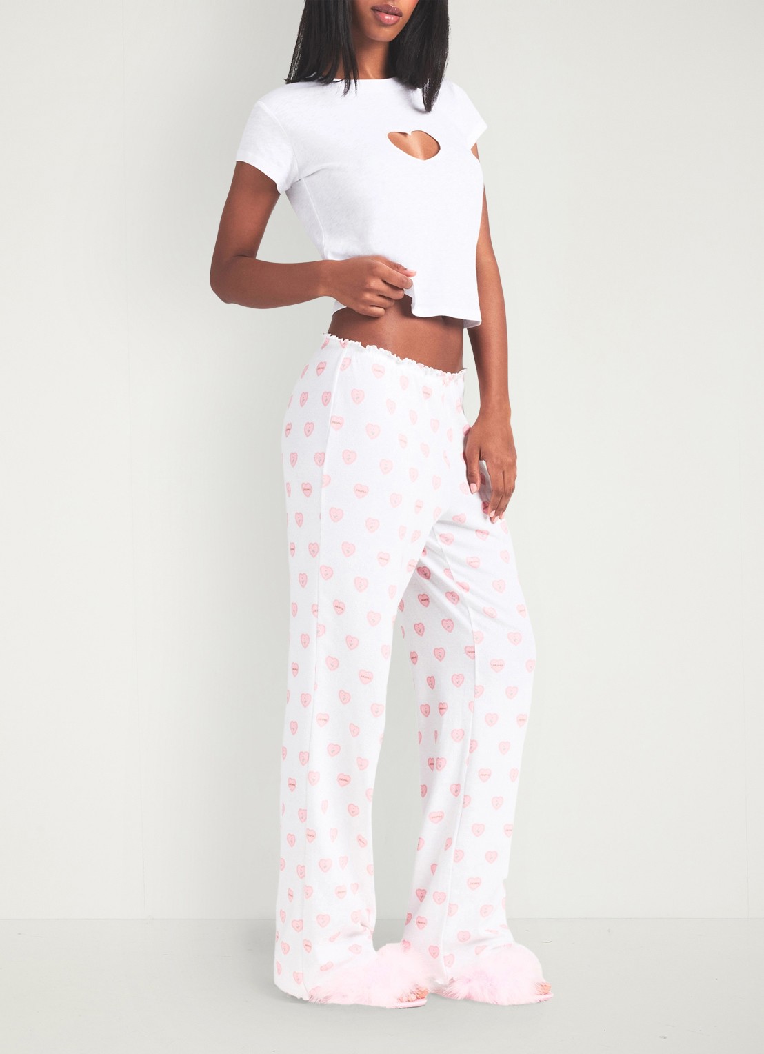 SKIMS Pointelle straight fit pyjamabroek met print - detail 4 snow lace hearts