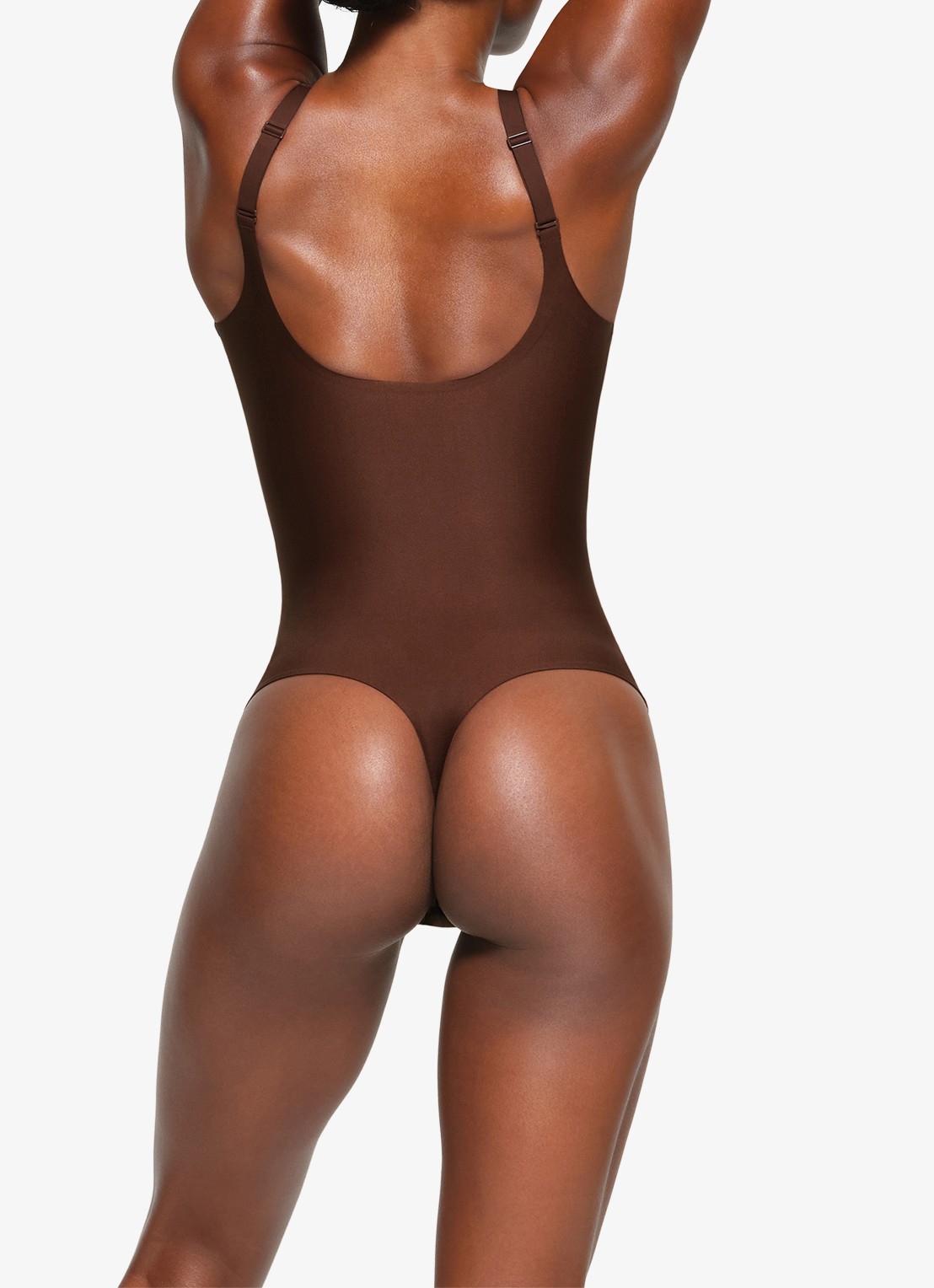 SKIMS Skims Body plunge stringbody - achterkant chocoladebruin