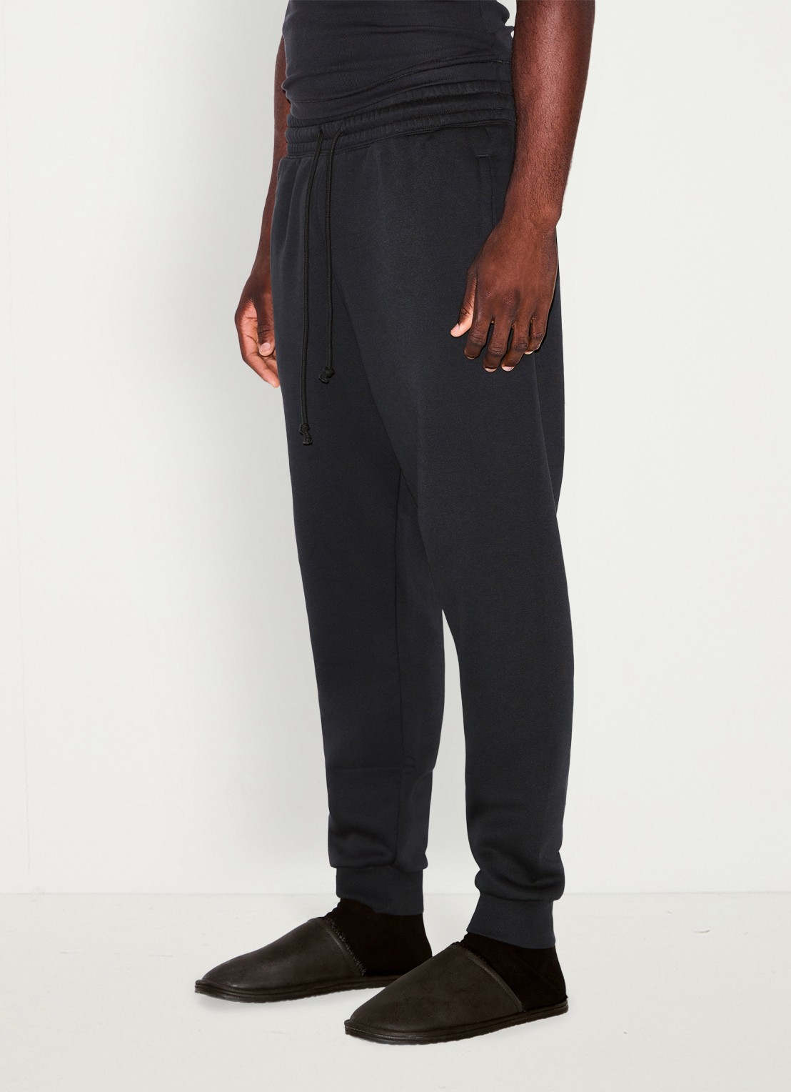 SKIMS Tapered fit joggingbroek met steekzakken - detail 3 washed onyx