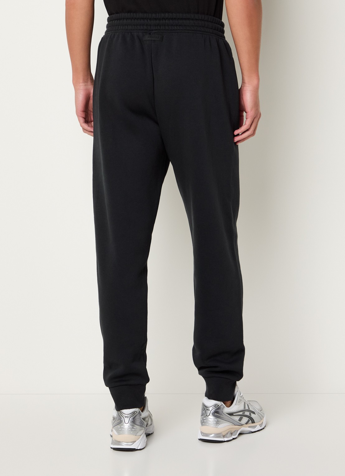 SKIMS Tapered fit joggingbroek met steekzakken - achterkant 7 washed onyx
