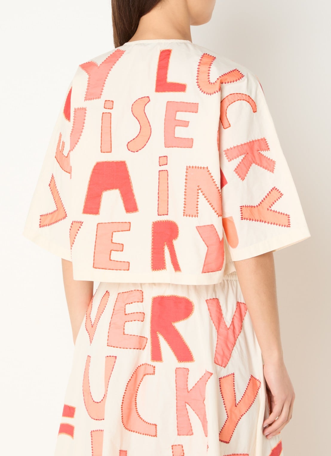 Stella Nova Cruise cropped blouse met borduring - achterkant 4 oranjerood