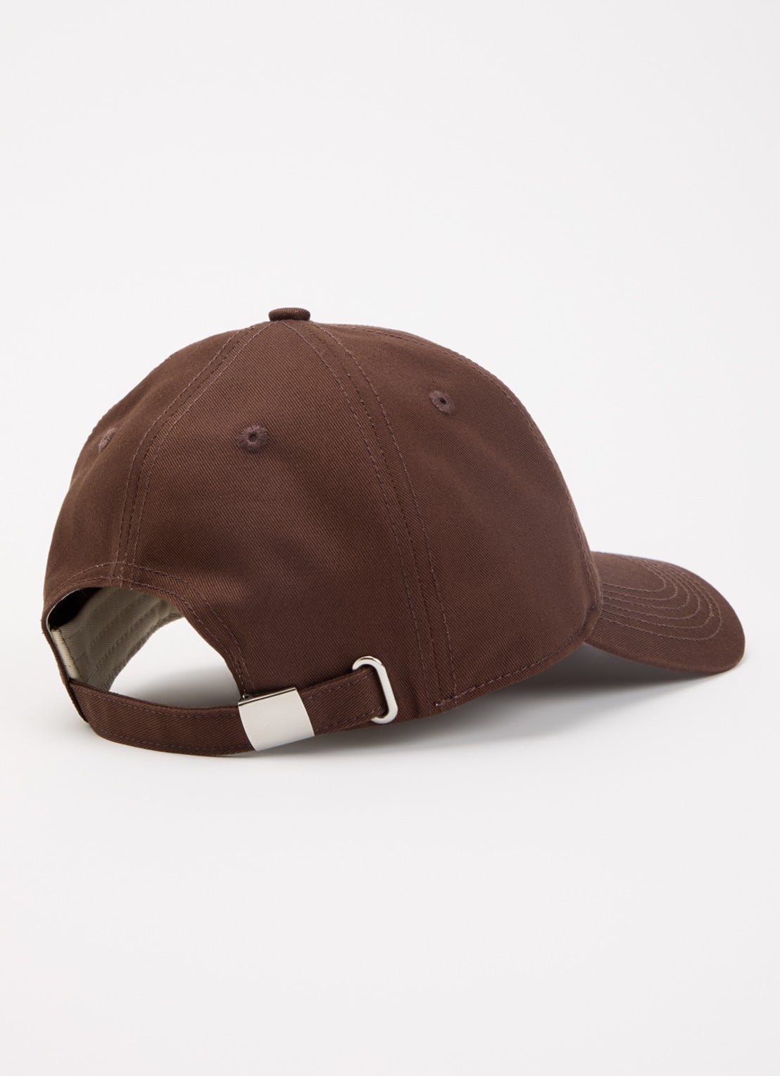 Stieglitz Pet met logo - detail donkerbruin