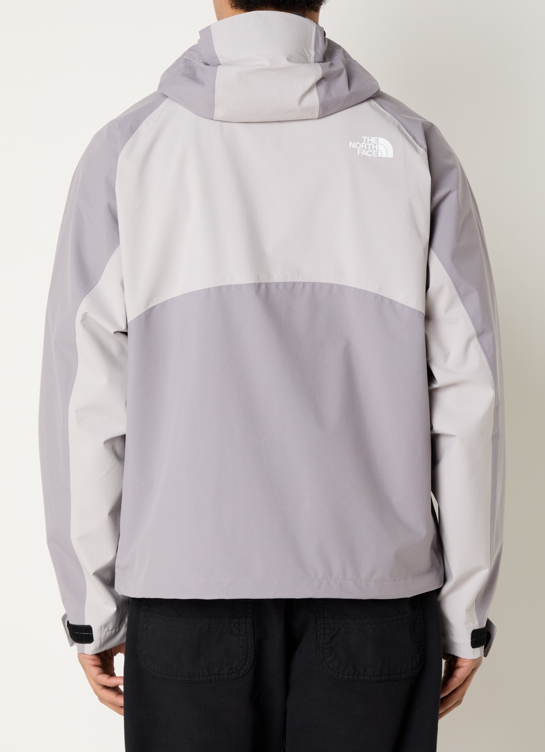 The North Face Jack met logo en ritszakken - achterkant lichtgrijs