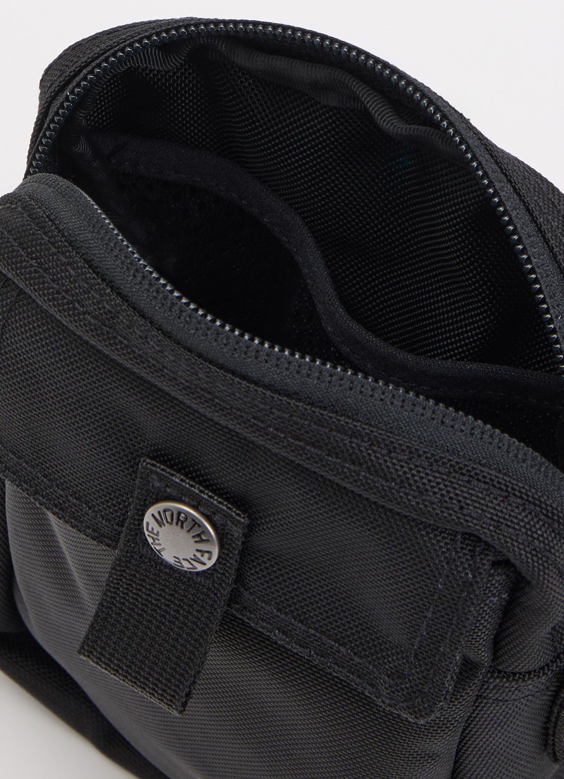 The North Face Redbox S crossbodytas met logo - detail zwart