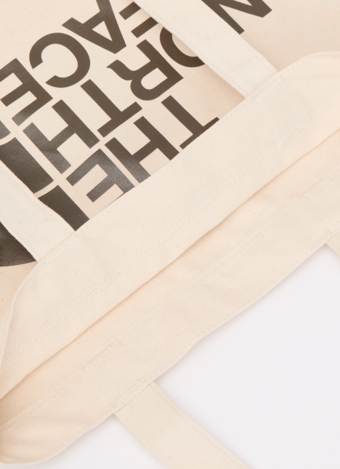 The North Face Shopper van canvas met logo  - detail beige