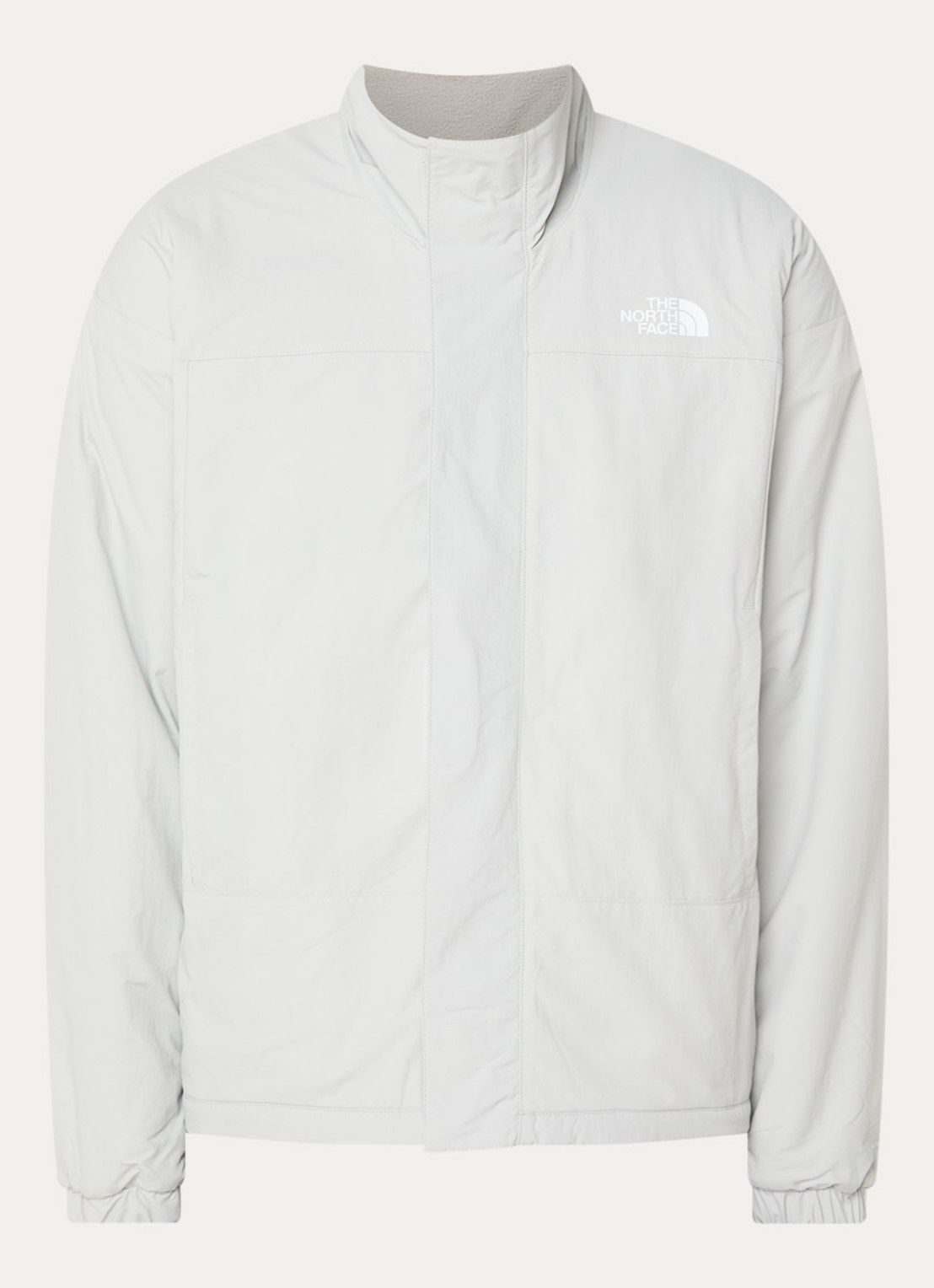 The North Face Yumiori reversible jack van teddy met ritszakken - voorkant lichtgrijs