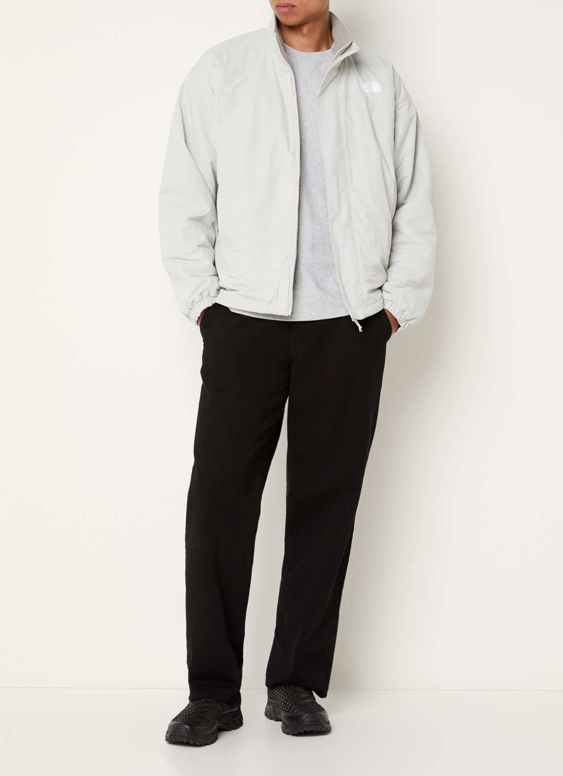 The North Face Yumiori reversible jack van teddy met ritszakken - voorkant 3 lichtgrijs