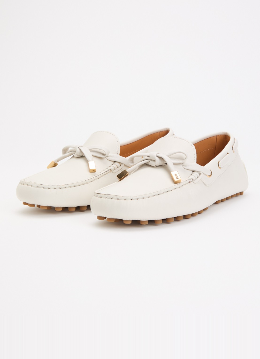 Tod's Gommino mocassin van kalfsleer - detail gebroken wit