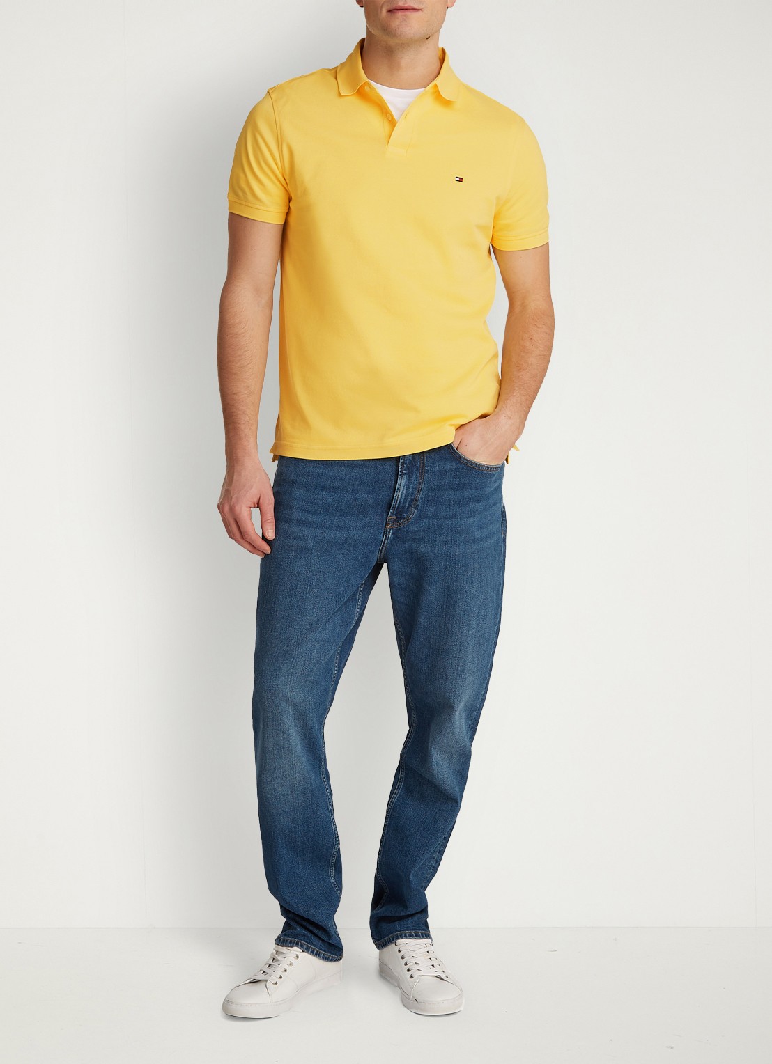 Tommy Hilfiger Core regular fit polo van piqué katoen met logoborduring - voorkant 5 citronella / geel