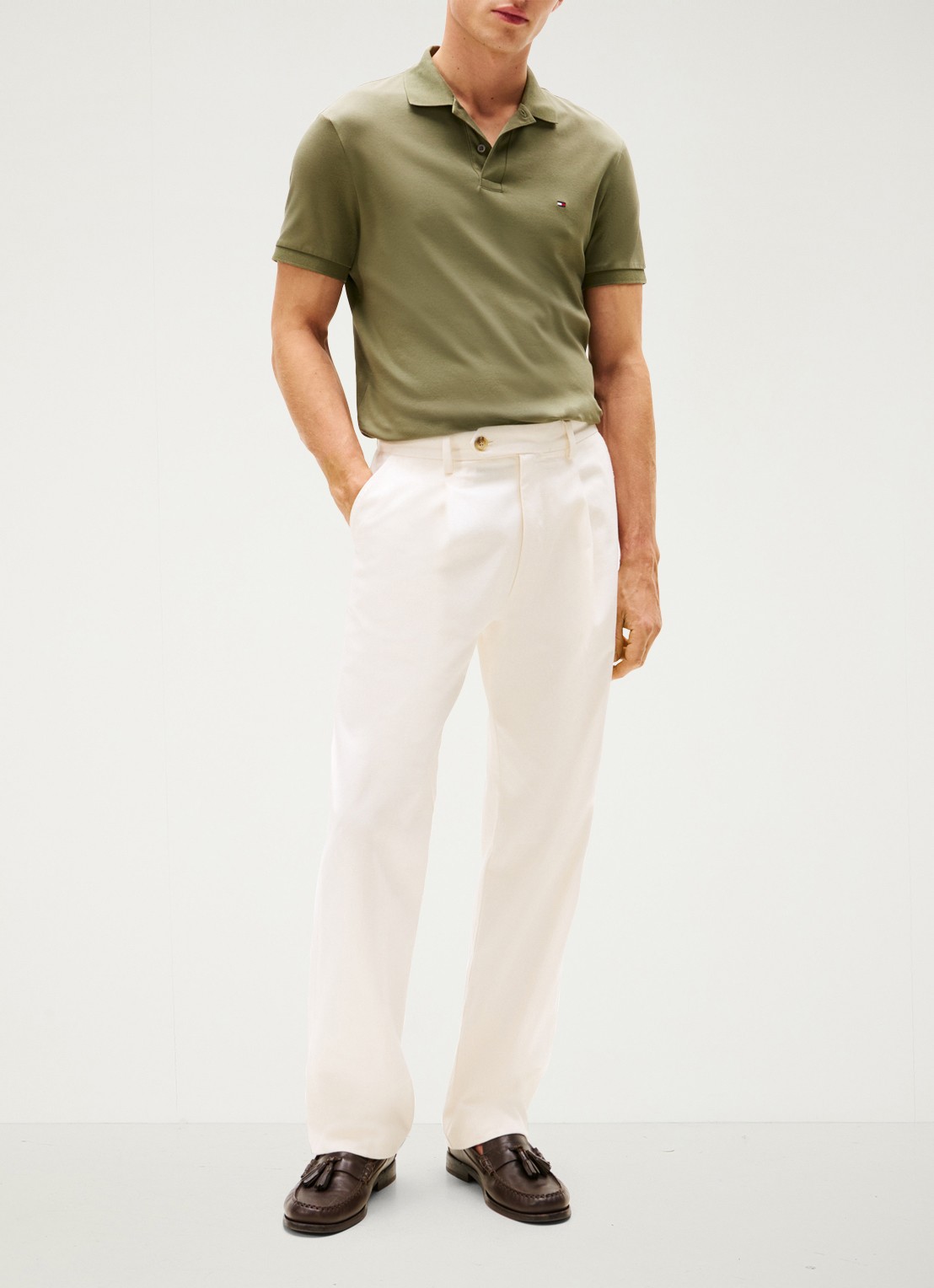 Tommy Hilfiger Regular fit polo met logo - voorkant 2 battle green-pli / groen