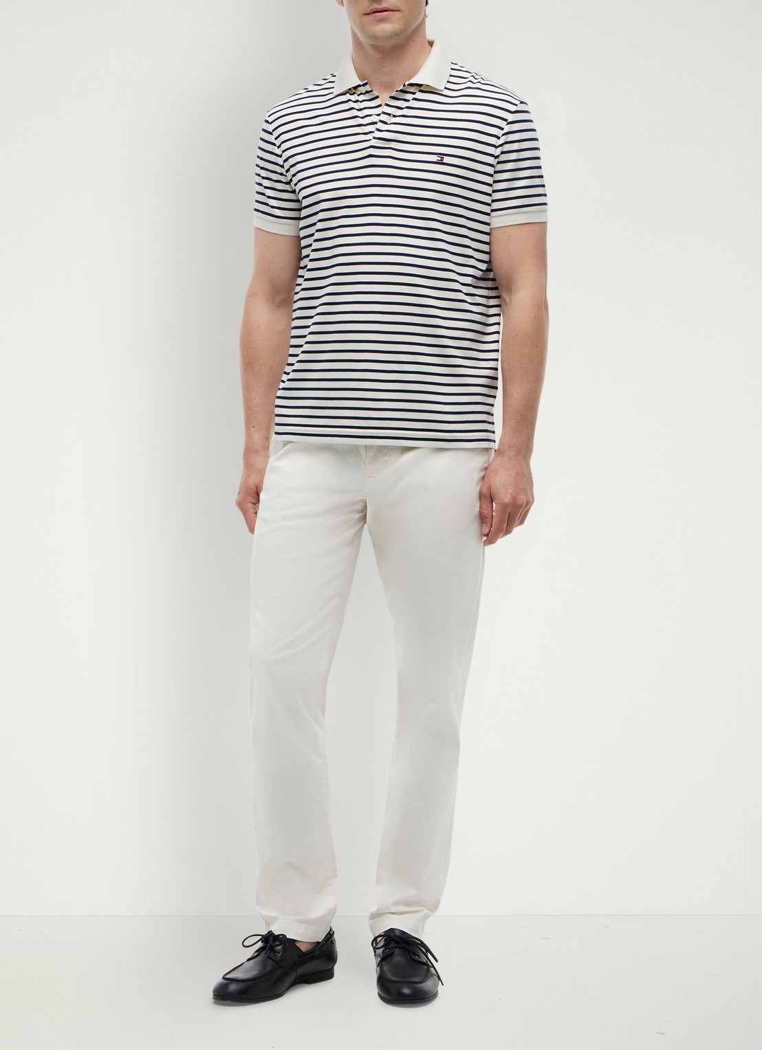 Tommy Hilfiger Regular fit polo met logo - voorkant 2 ivory petal / navy blue-0fa / blauw