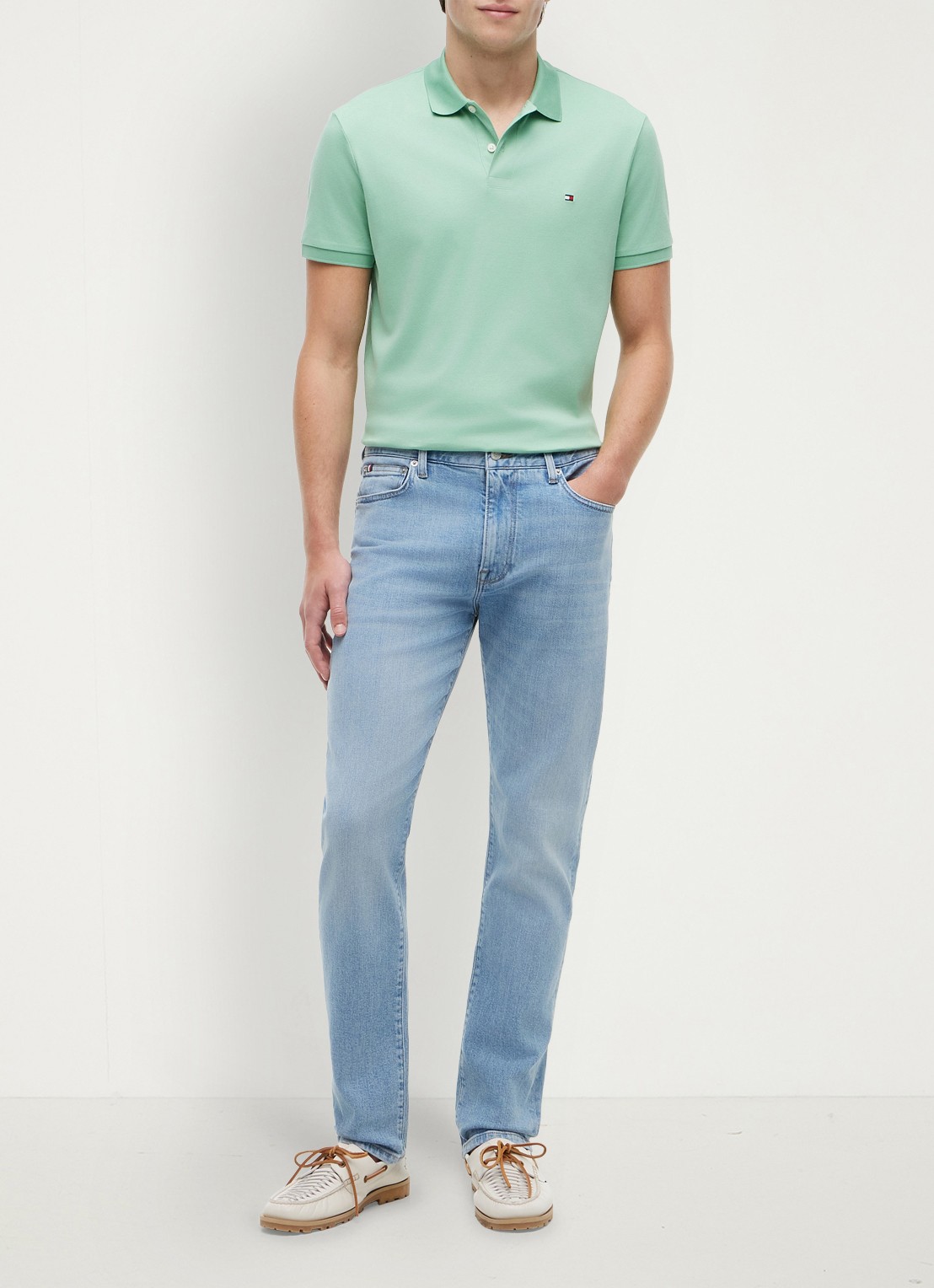 Tommy Hilfiger Regular fit polo met logo - voorkant 5 cut grass-l1a / groen