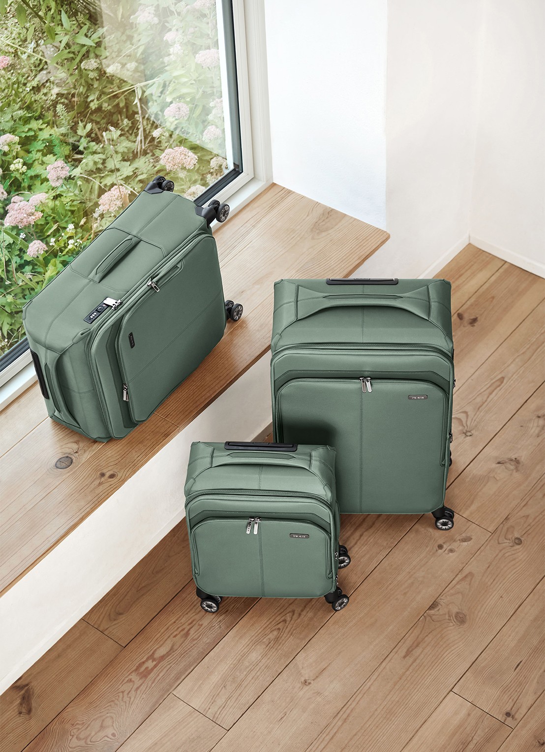 Travelite Priima M vergrootbare spinner 68 cm - voorkant 8 olijfgroen