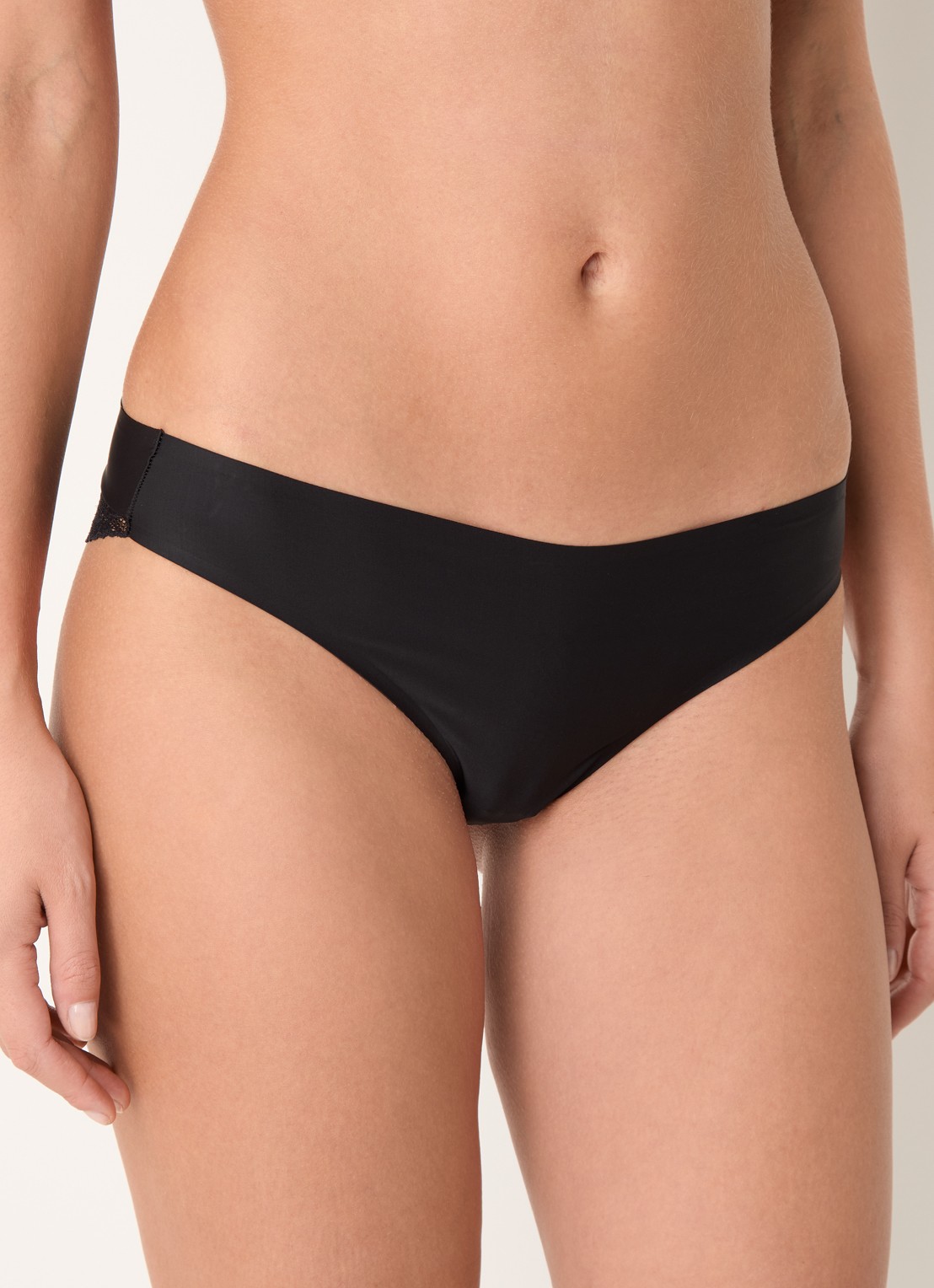 Triumph Body Make-Up Illusion high waisted naadloze tanga met kant - detail 4 zwart