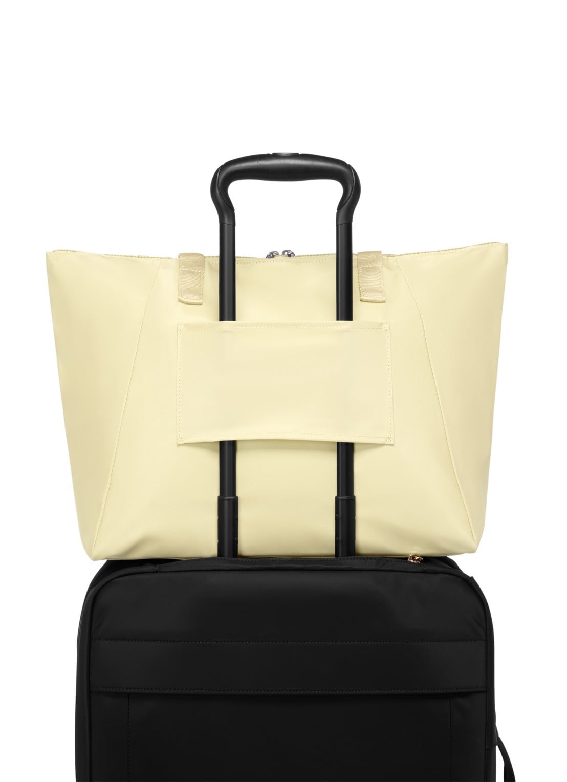 TUMI Just In Case Medium schoudertas met uitneembaar etui - detail geel