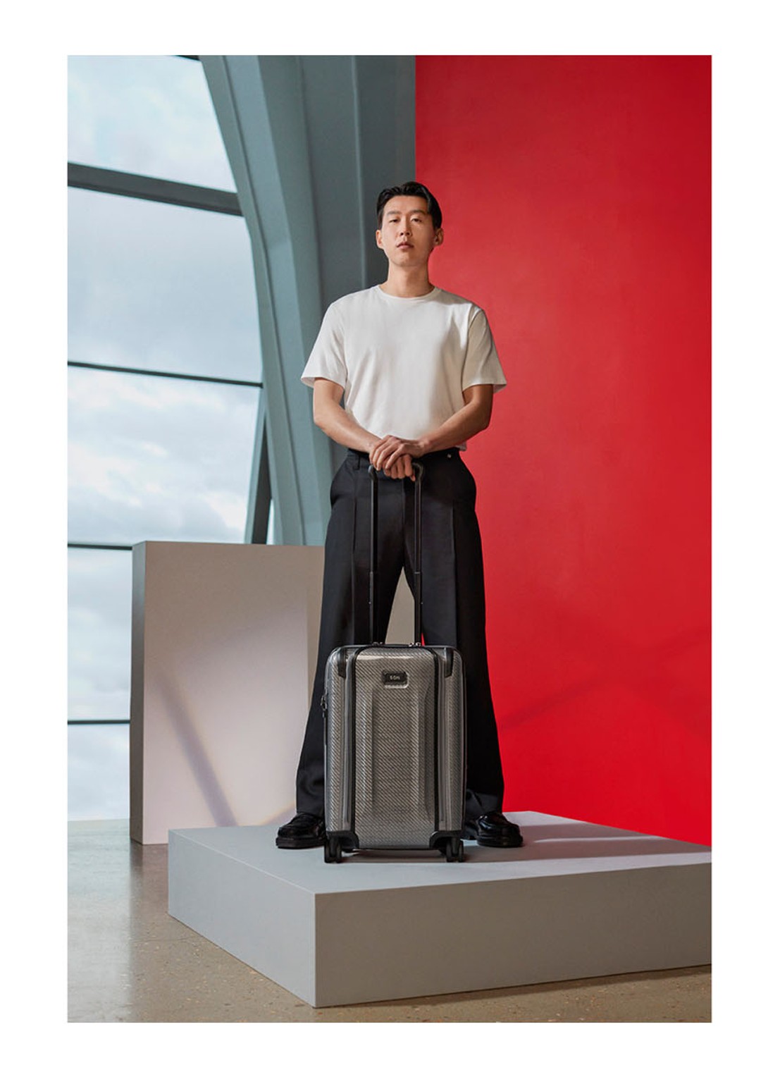 TUMI Tegra-Lite International Front Pocket vergrootbare spinner 55 cm - voorkant 2 antraciet