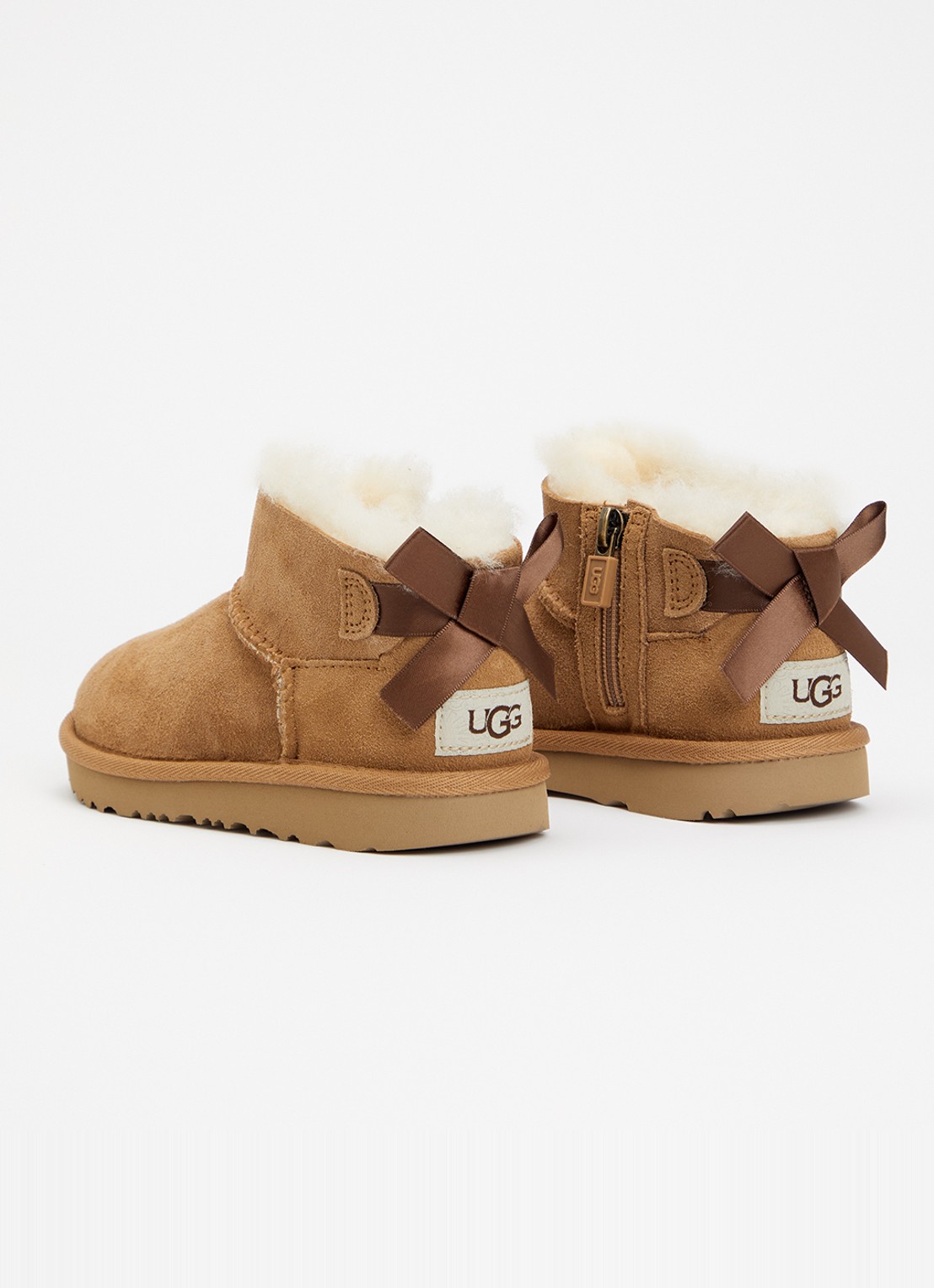 UGG Ultra Mini Bailey Bow enkellaarsje van suède - achterkant 7 kastanjebruin